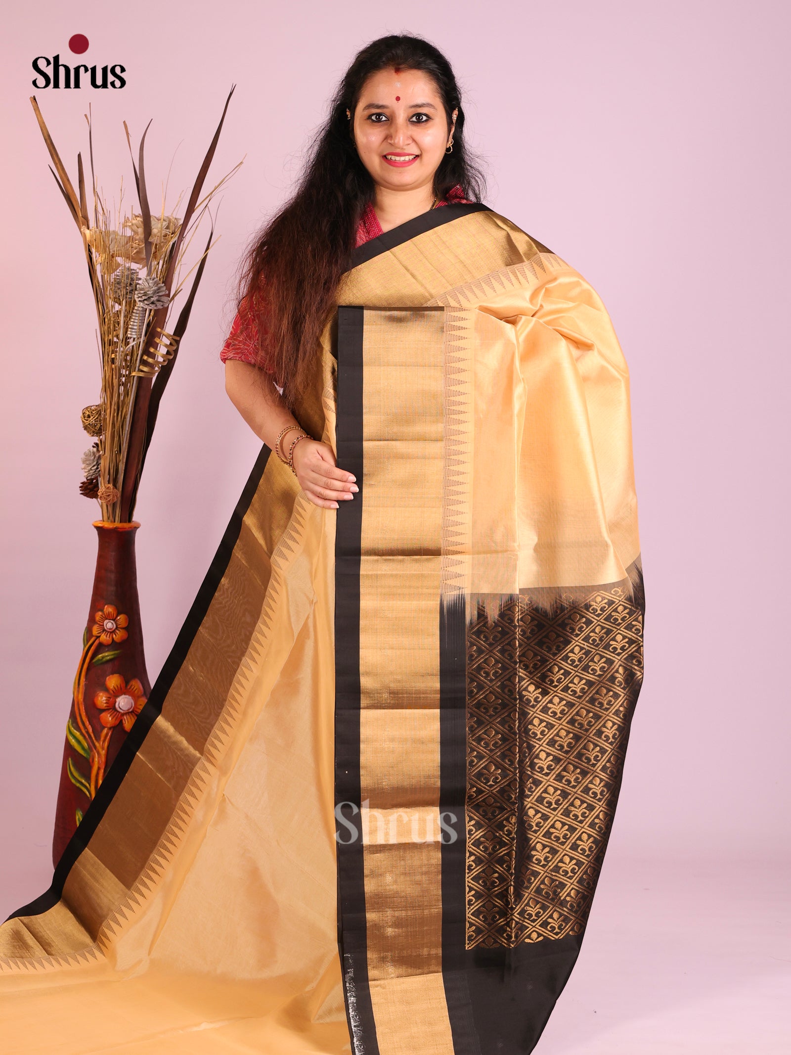 sandle and black temle boarder saree