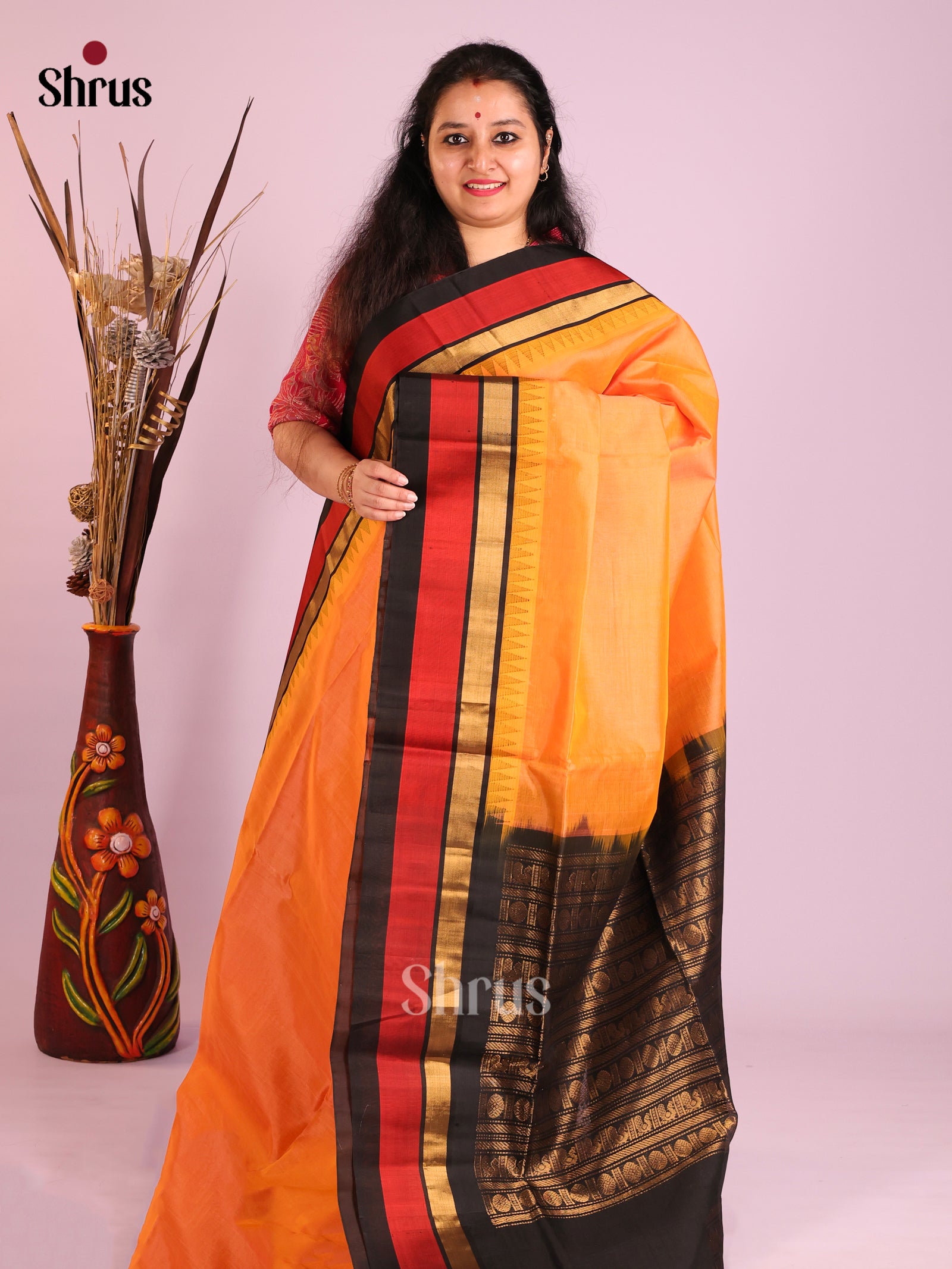 Orange Black Temple border Saree