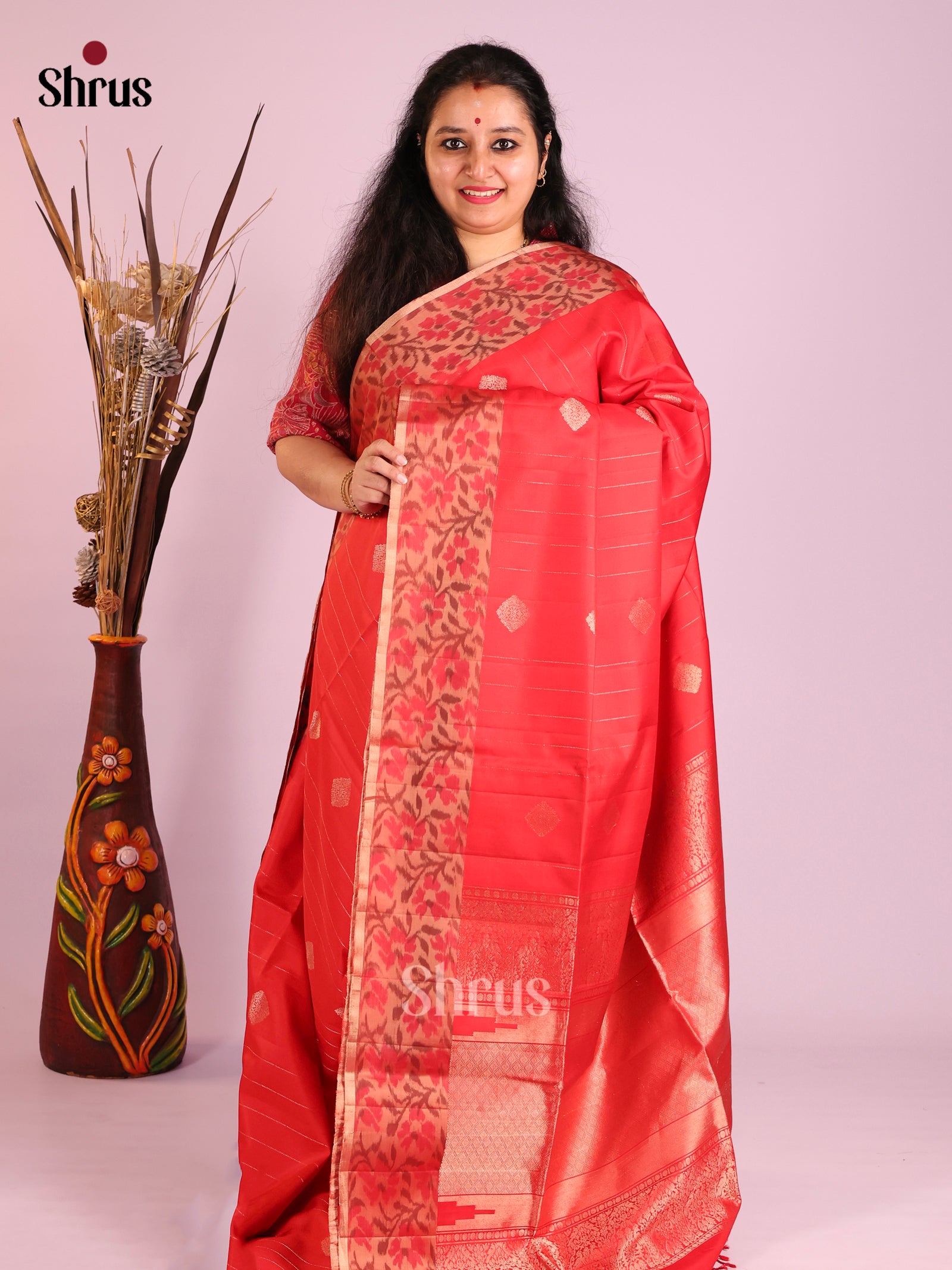 Charming Red Soft Silk Saree with gold zari Stripes, buttas & ikkat Floral border