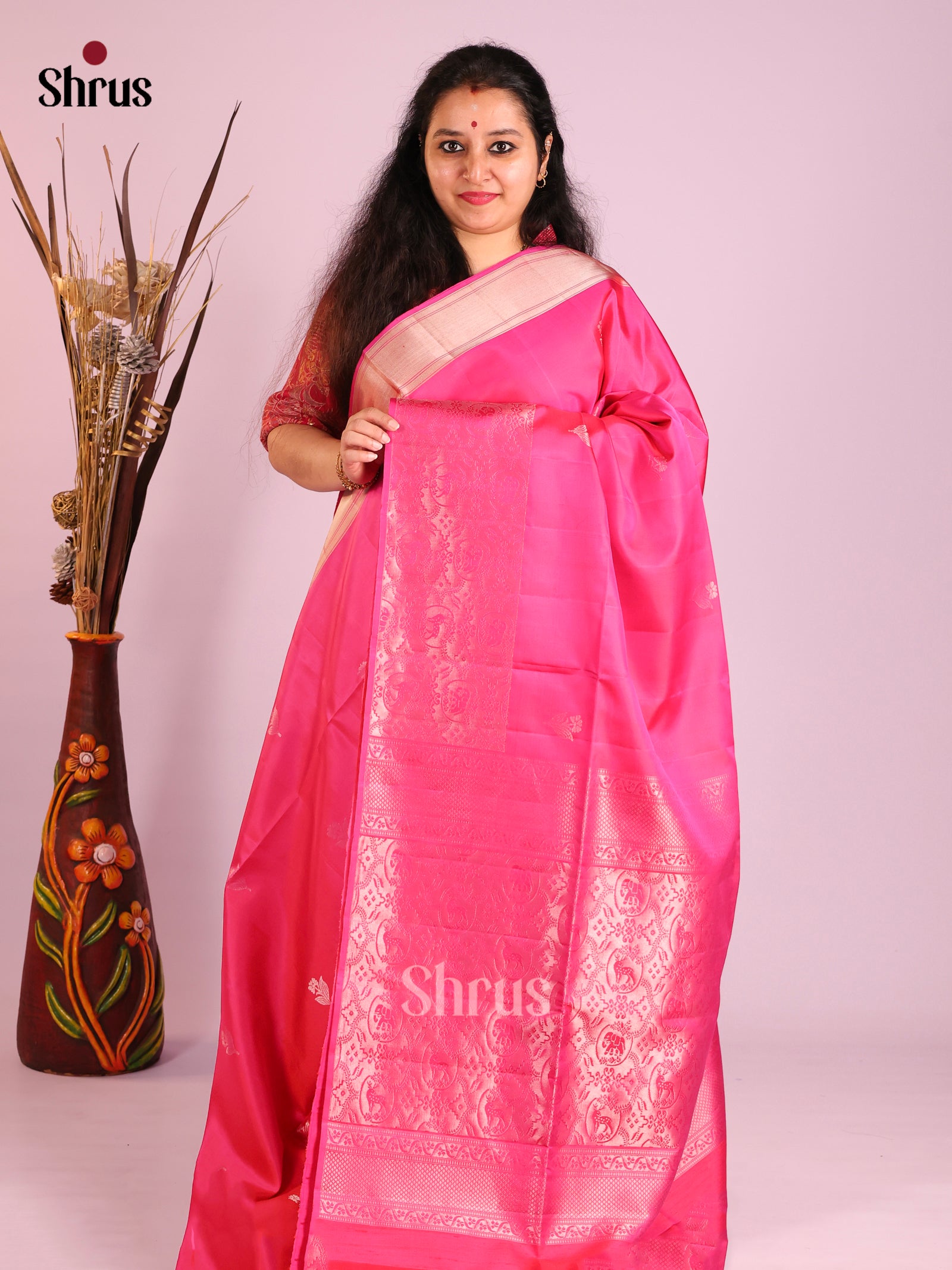 Charming Pink Soft Silk Saree with Zari Buttas & rich flora fauna border