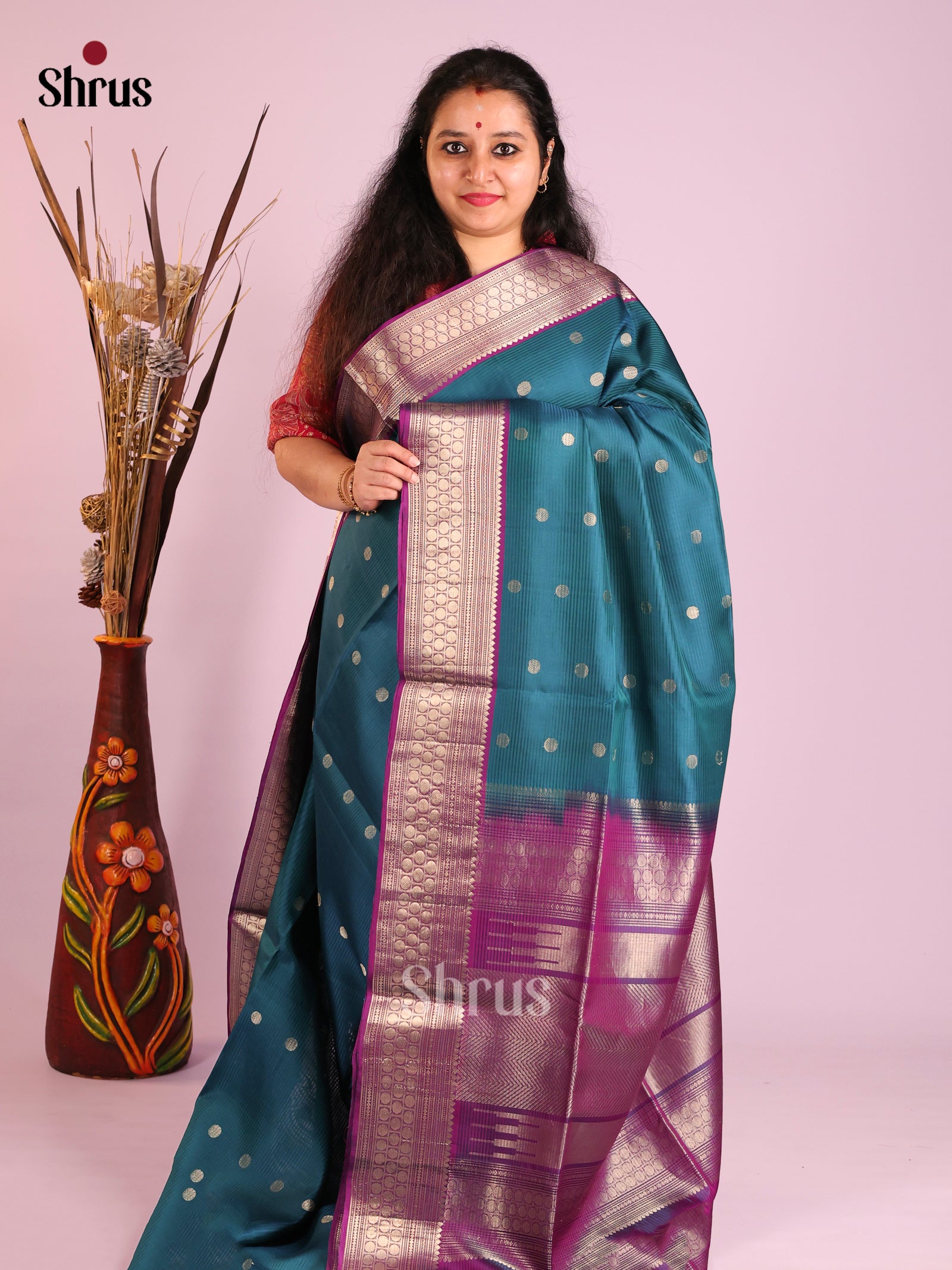 chic Peacock Blue Soft Silk Saree with rudraksh buttas & Purple Brocade Pallu