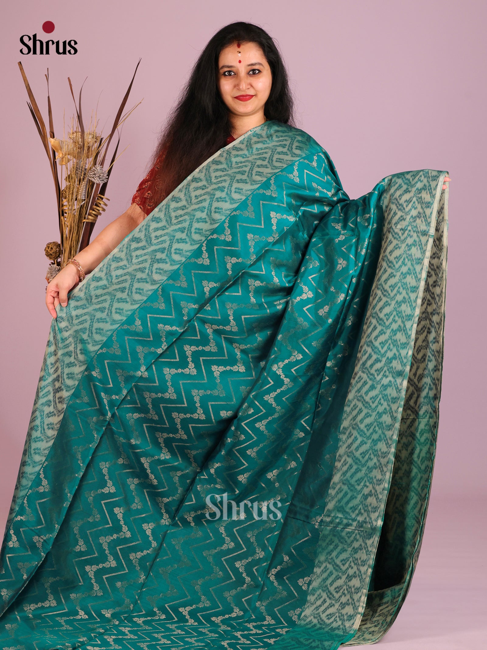 Exquisite Teal Soft Silk Saree With Zari woven Zig Zag Pattern 1