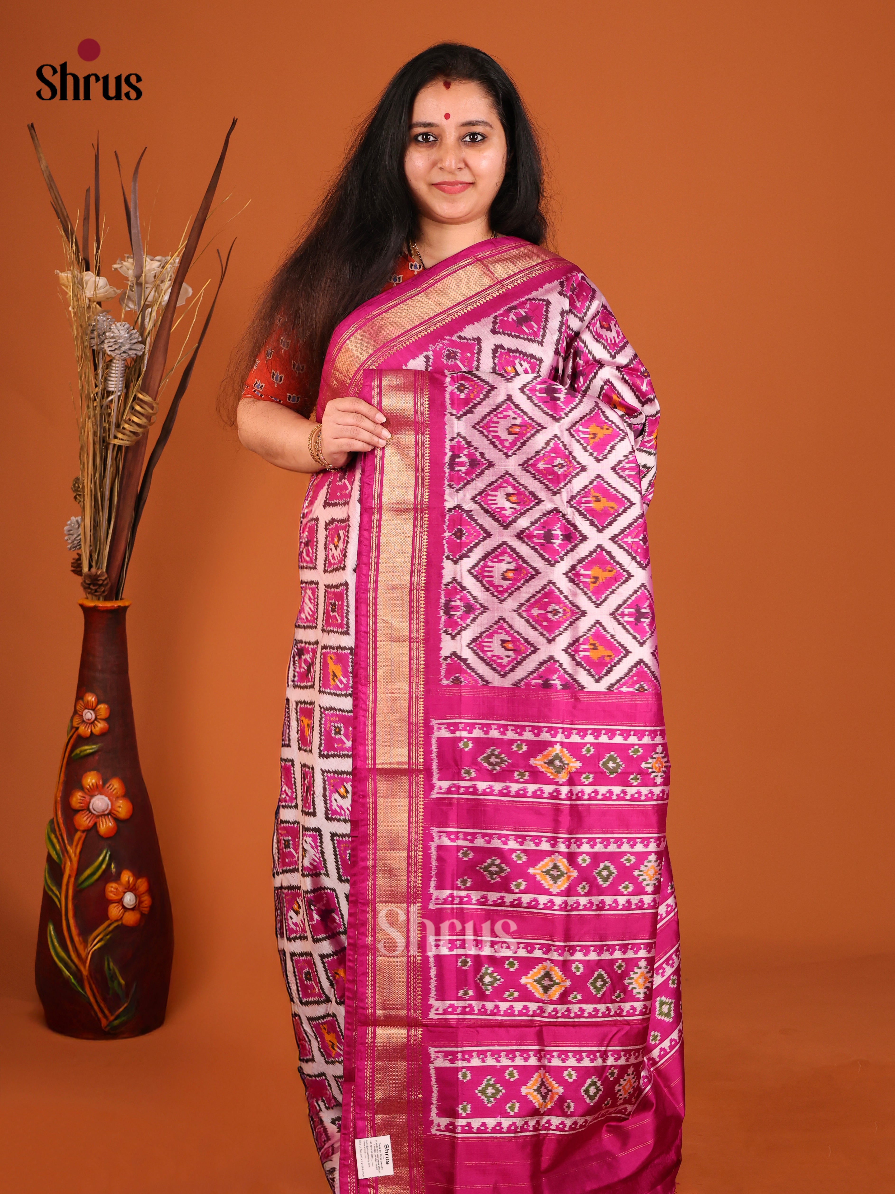 DIS16516 - Ikkat Silk Saree