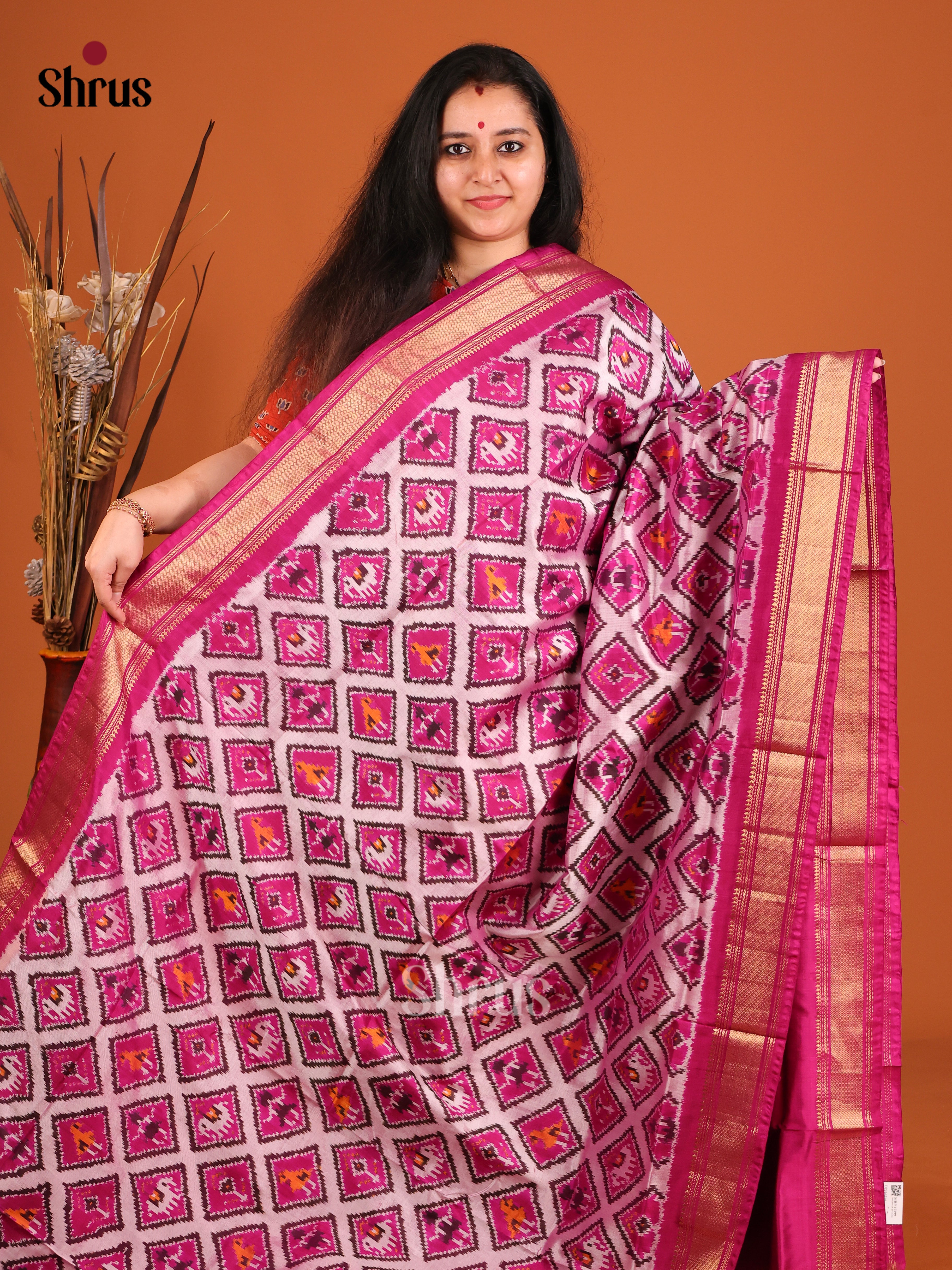 DIS16516 - Ikkat Silk Saree