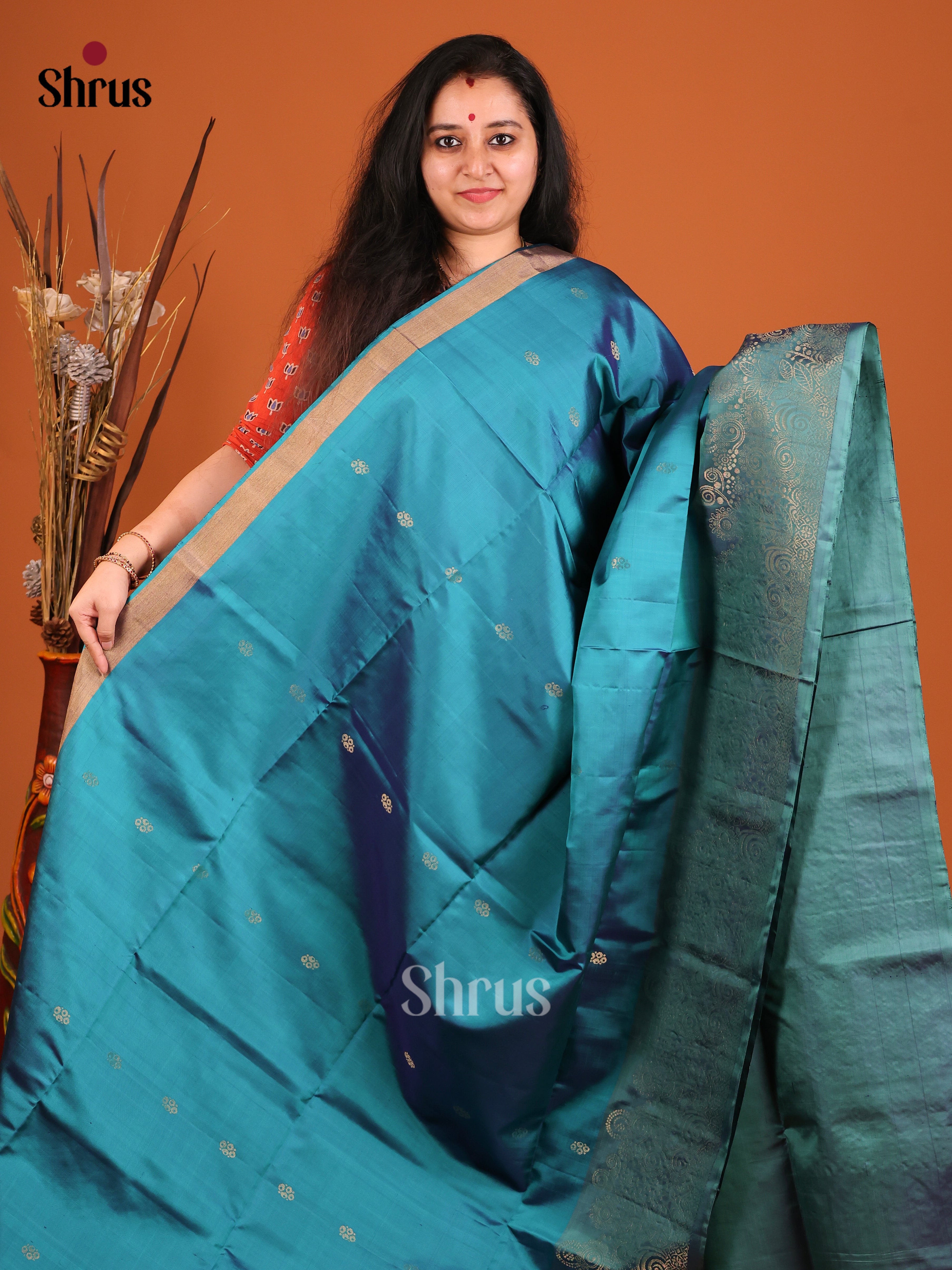 Vibrant Blue Soft Silk Saree with Gold Buttas & Floral zari brocade border 1