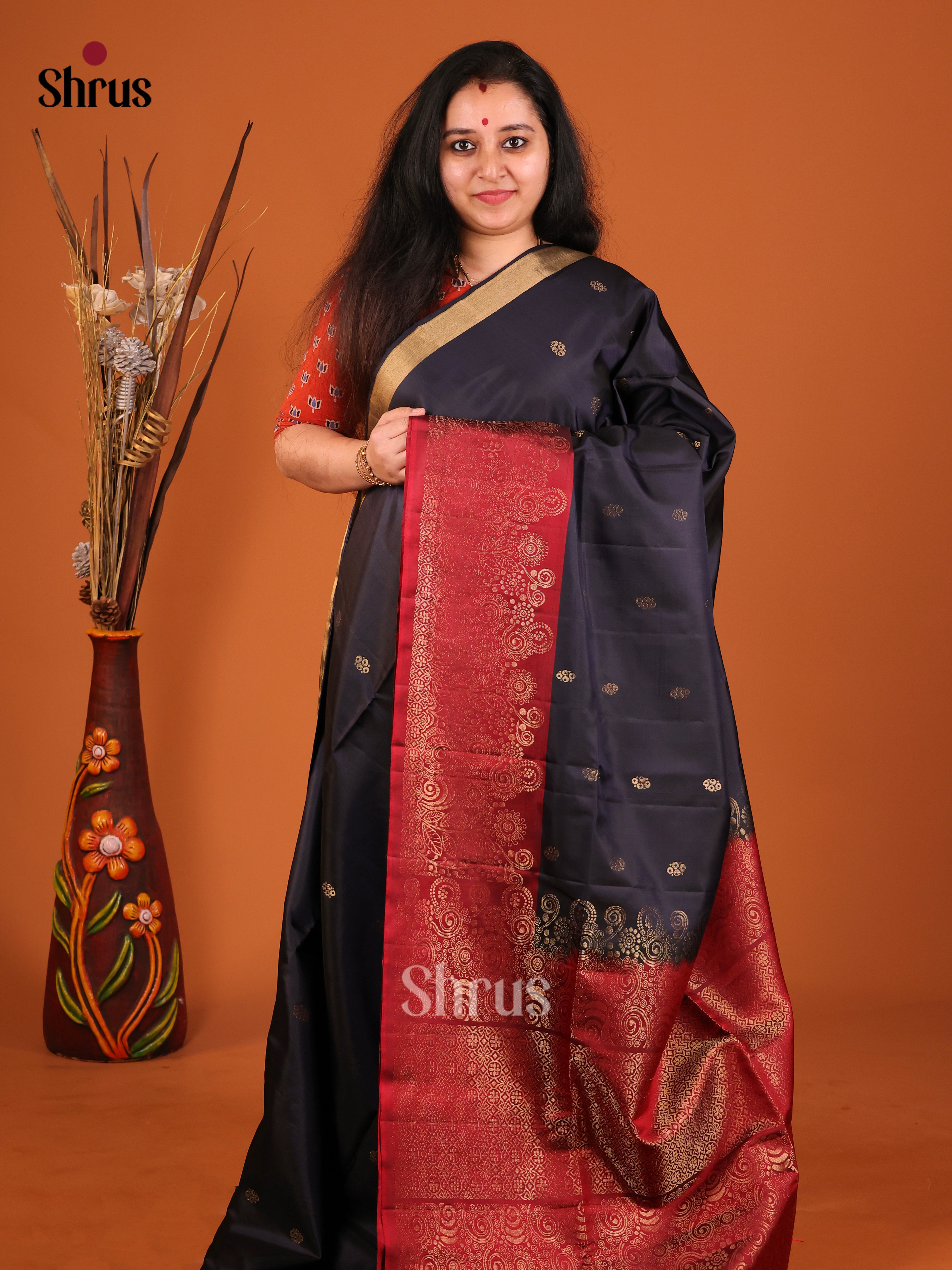 Blue & Maroon Soft Silk Saree gleams with gold zari floral buttas