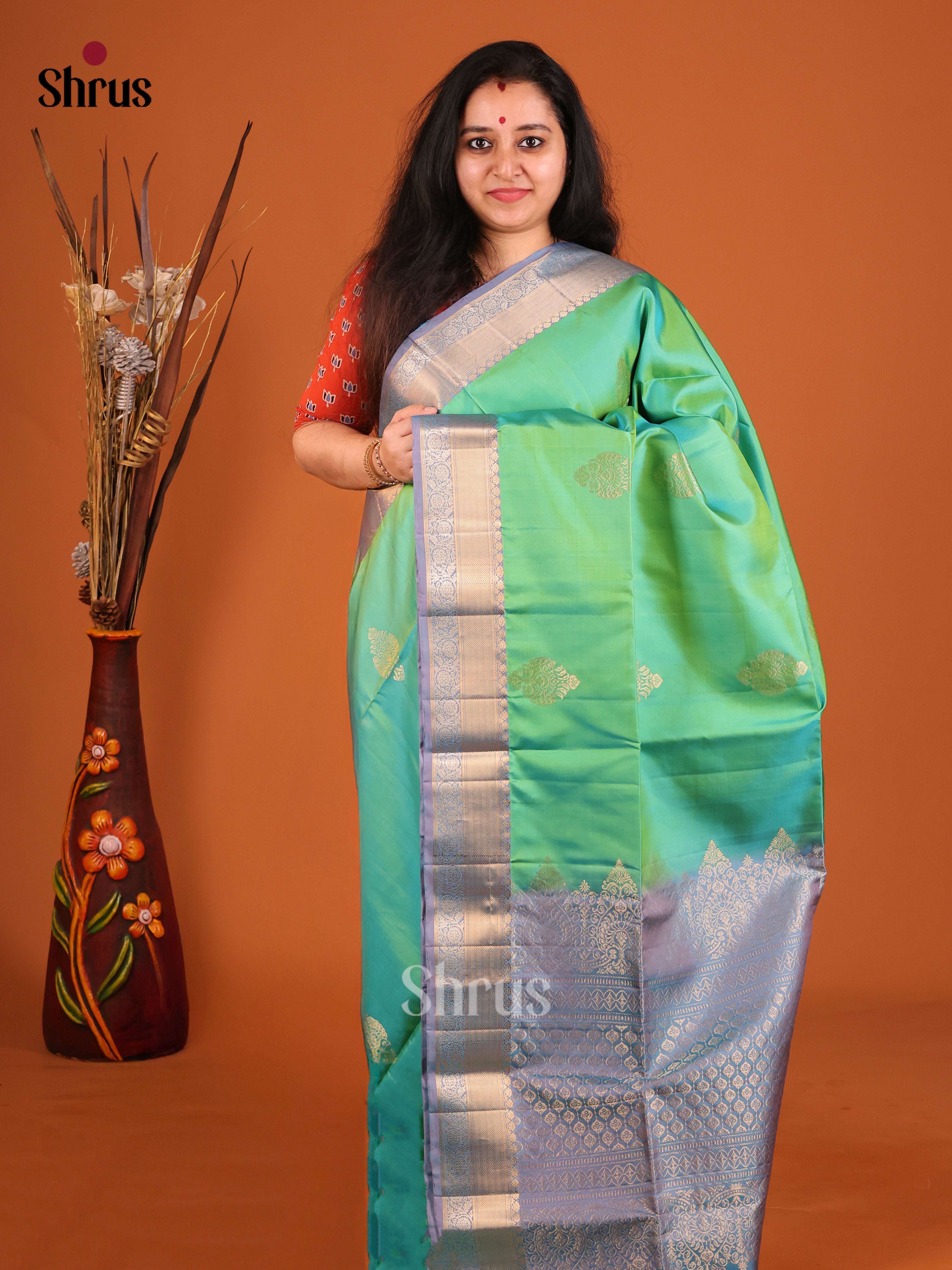 Enchanting Green Soft Silk Saree with gold zari floral motifs, rich equal border - Shop on Shrus.com