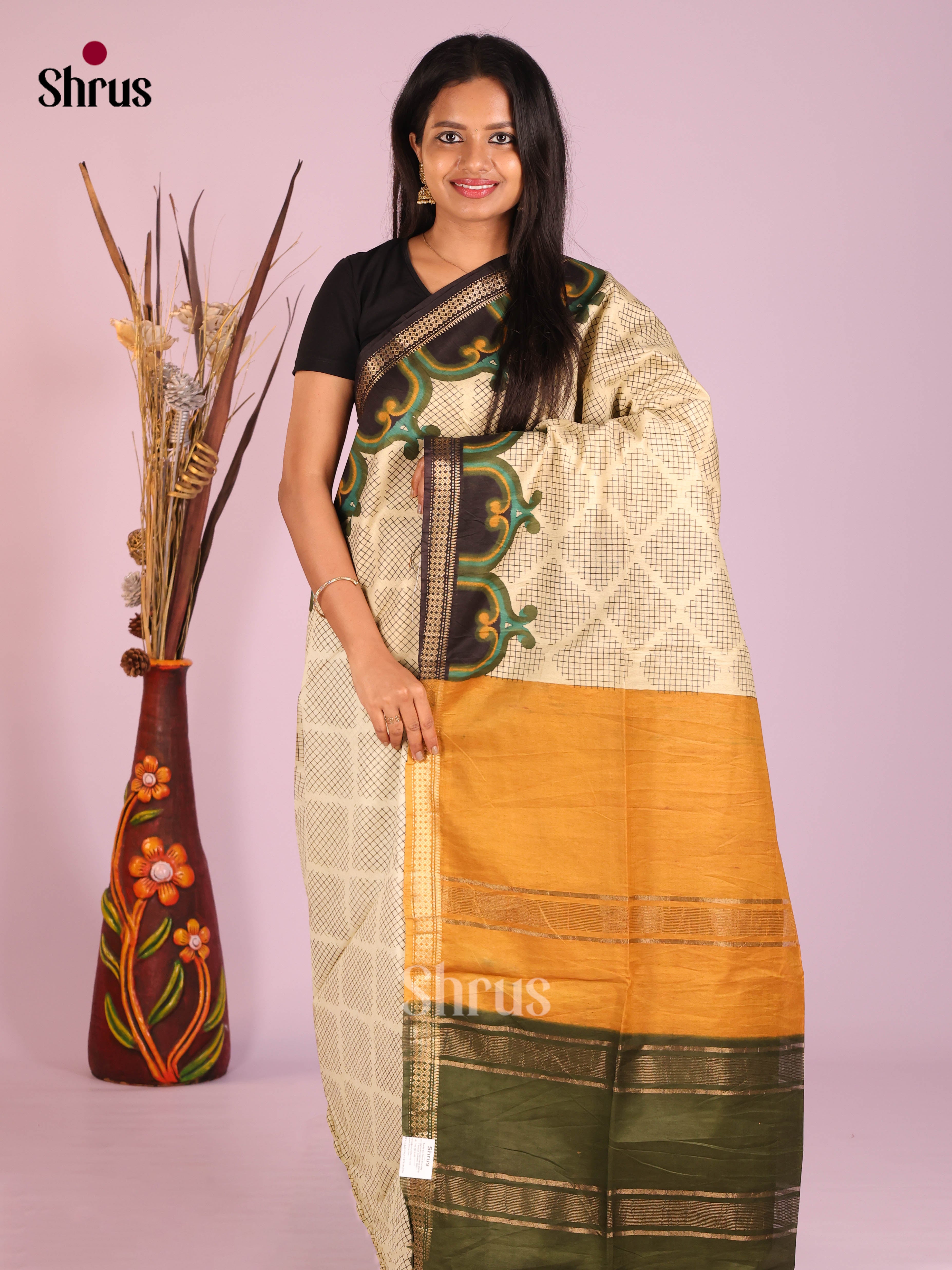 Cream & Green- Semi Tussar Saree
