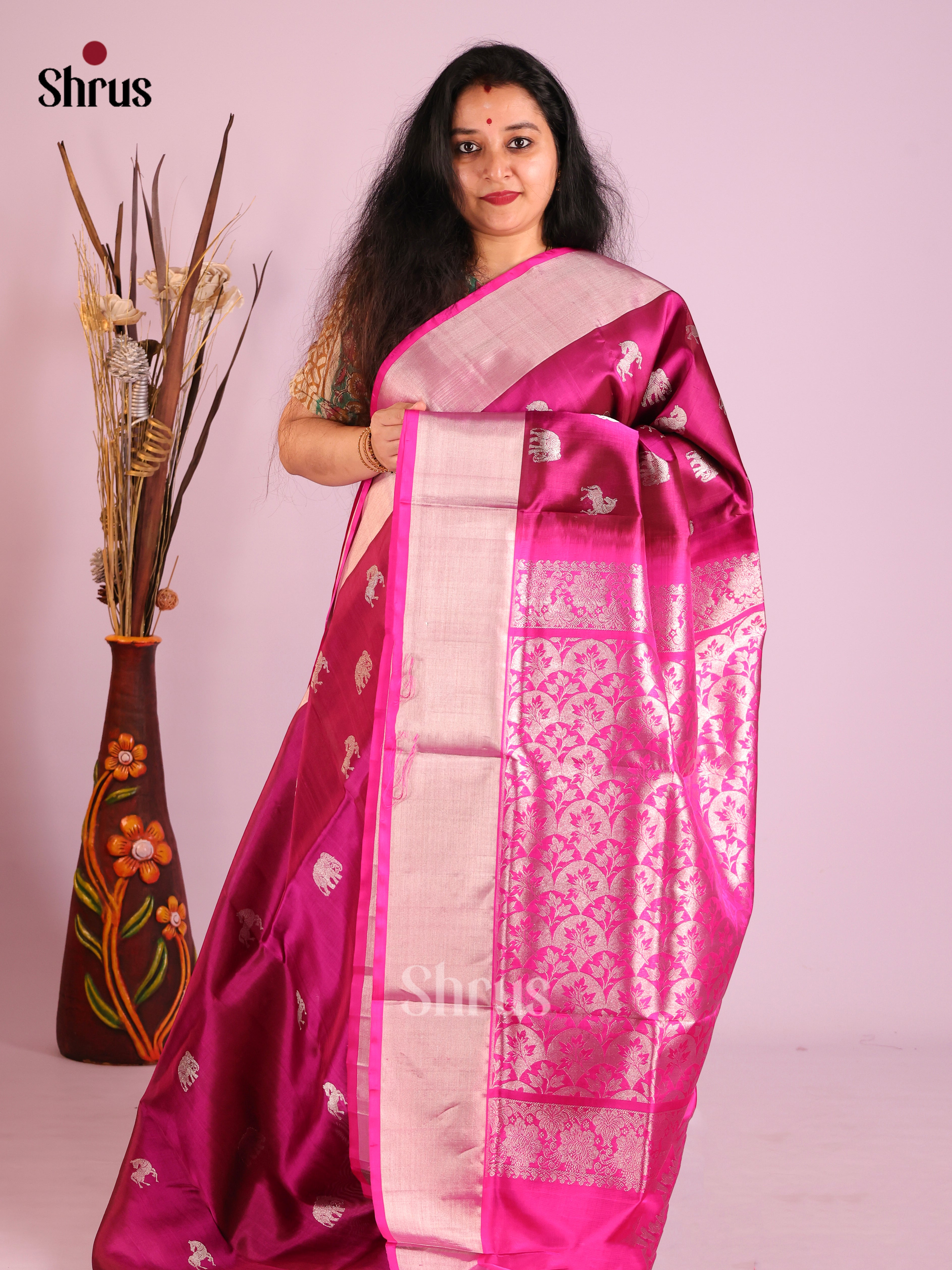 Purple & Pink Venkatagiri silk Saree sizzlles with elephant , horse buttas