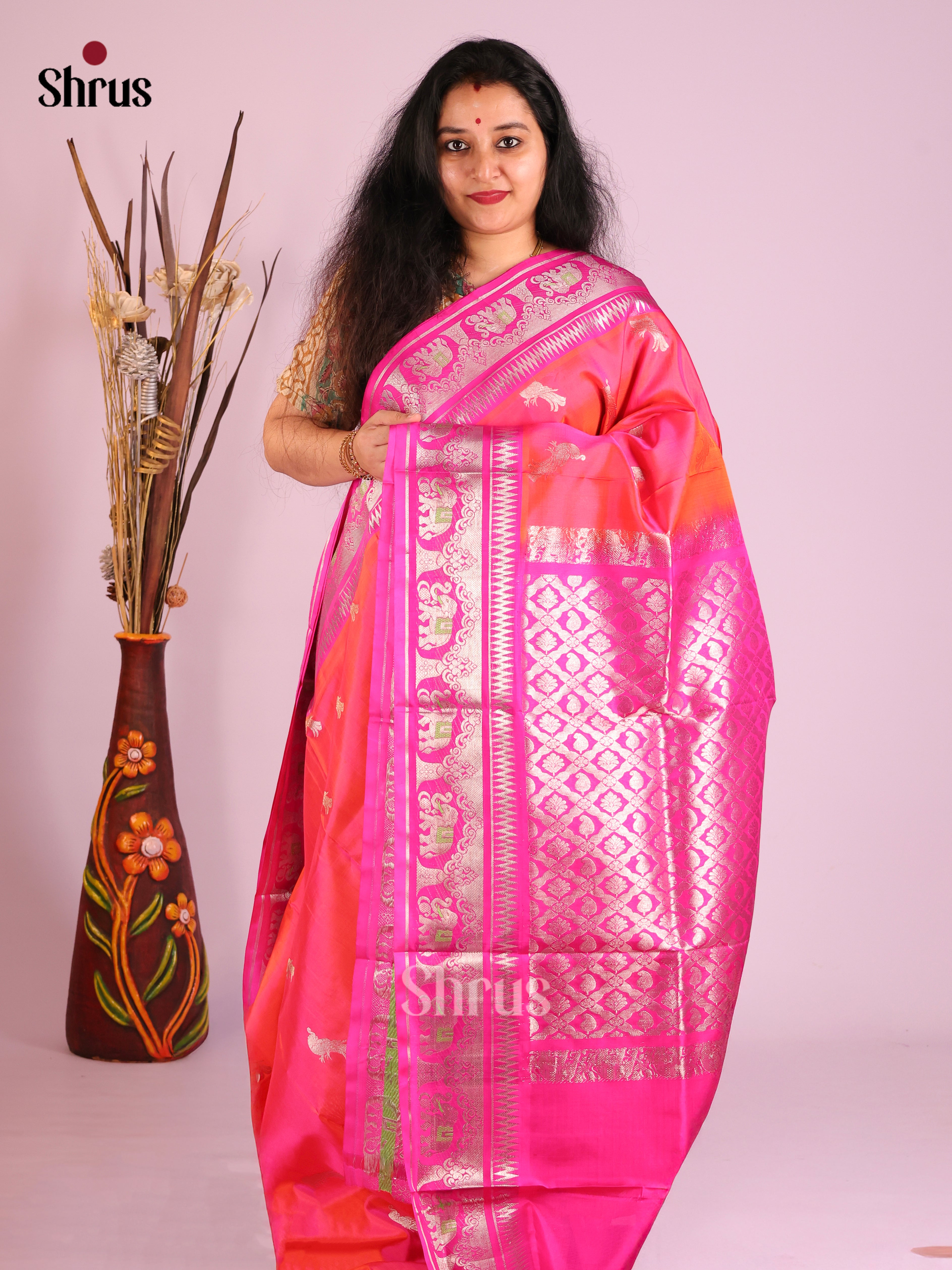 Orangish Pink & Pink Venkatagiri silk Saree gleams with zari peacock buttas