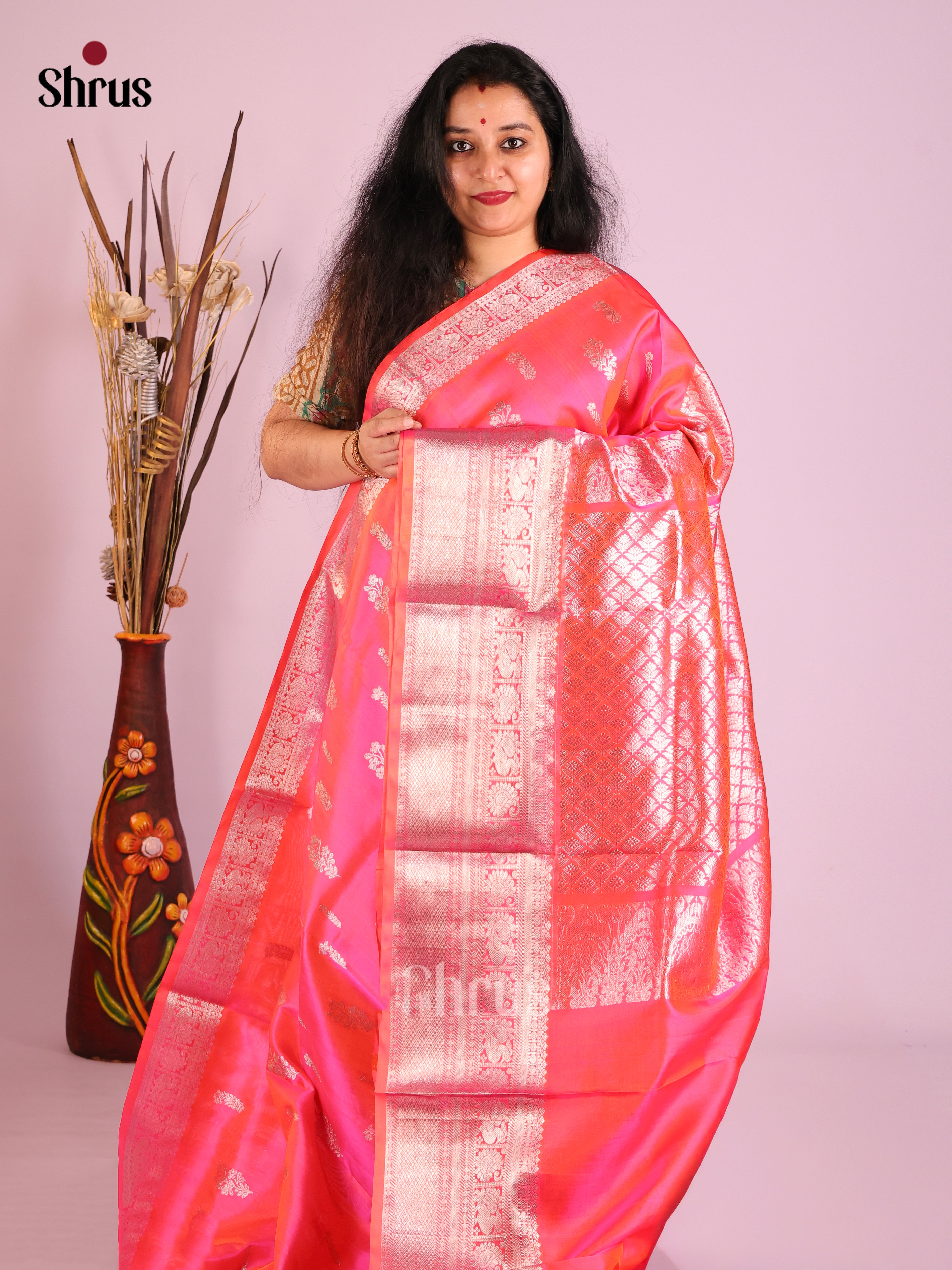 Orangish Pink Single Tone Venkatagiri silk Saree gleams with zari floral buttas & Brocade pallu