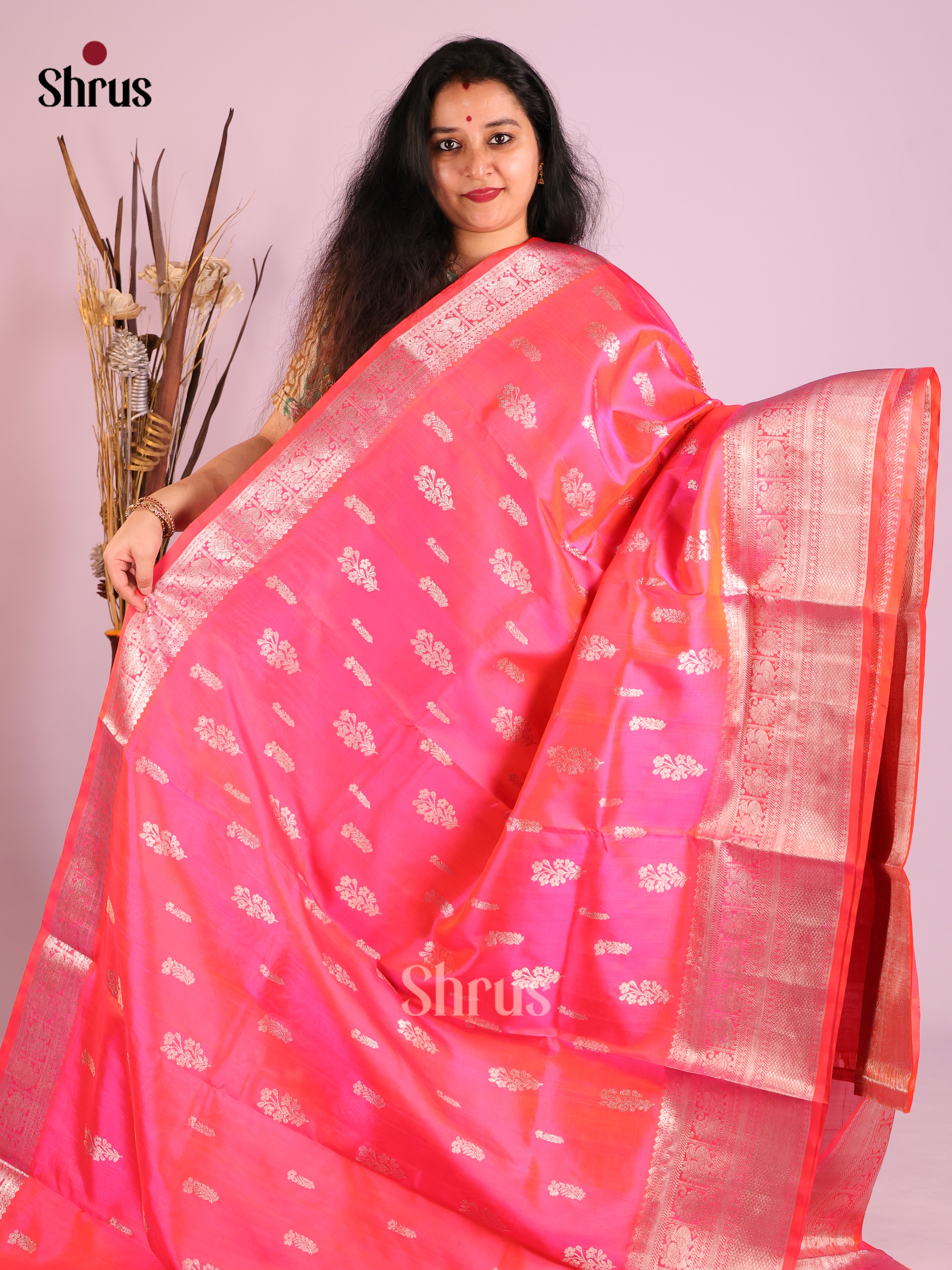 Orangish Pink Single Tone Venkatagiri silk Saree gleams with zari floral buttas & Brocade pallu