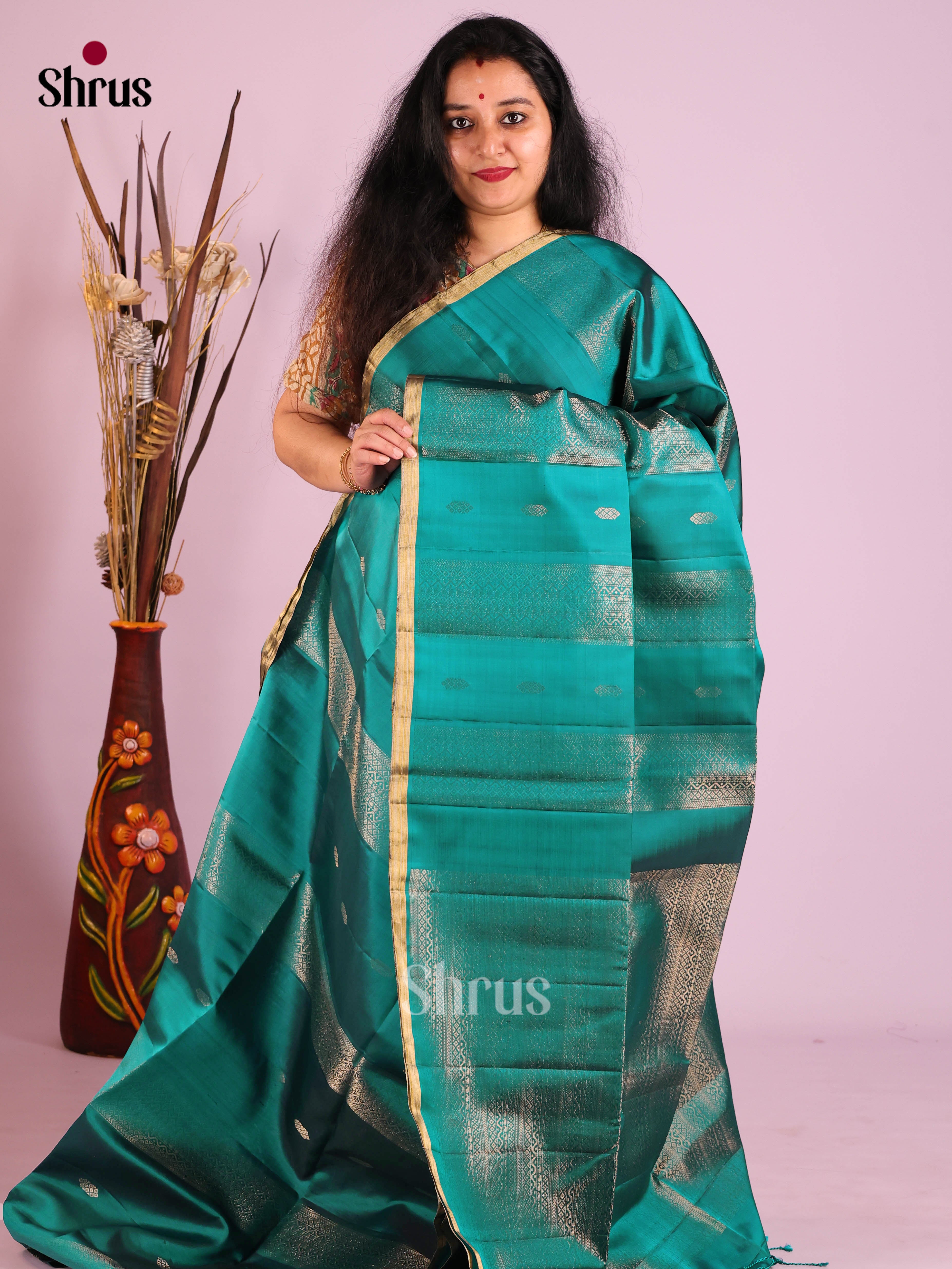 Elegant Teal Soft Silk Saree with Intricate Zari Woven Stripes, Buttas & brocade pallu