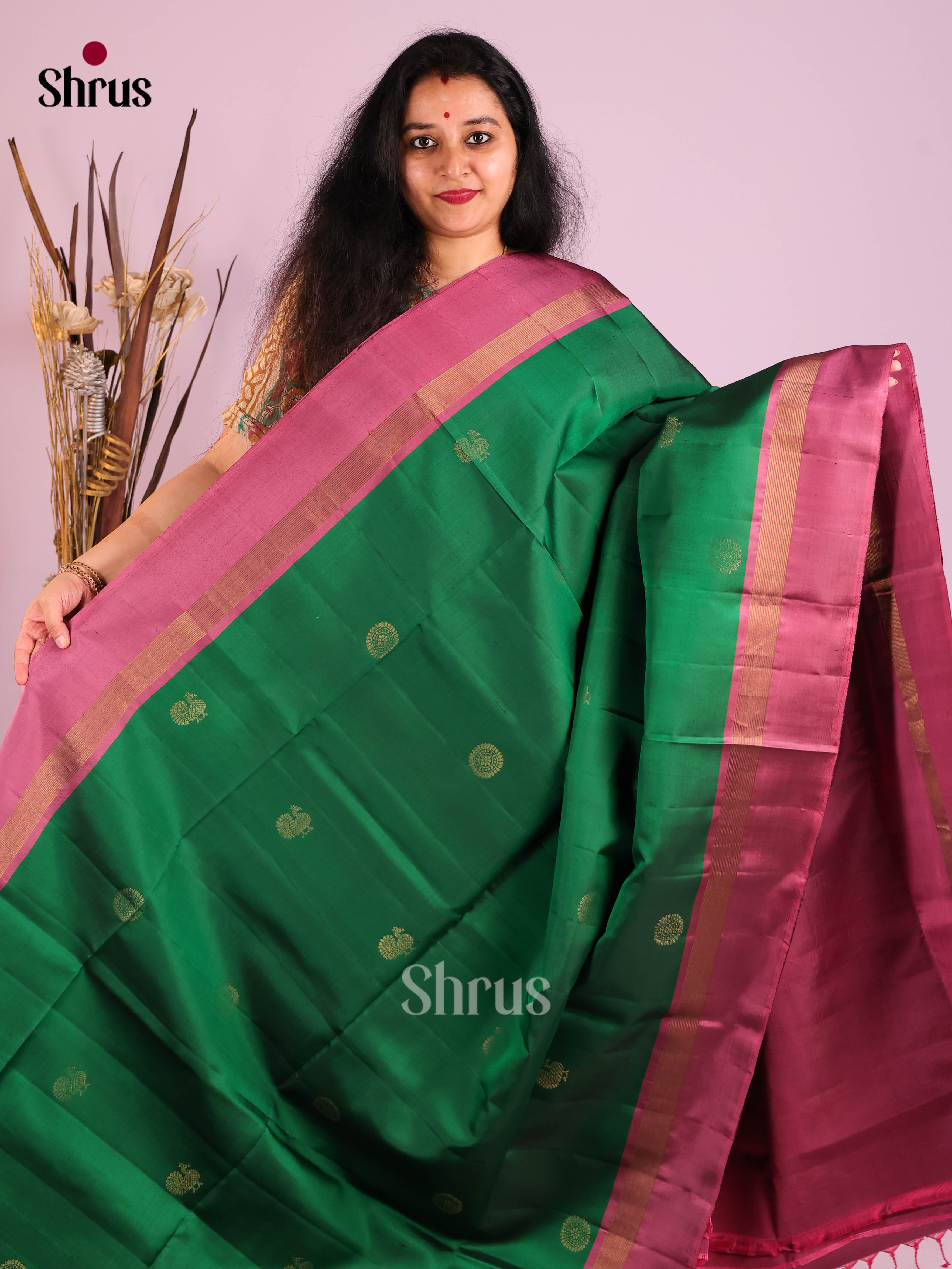 Exquisite Green Soft Silk Saree with gold zari peacock buttas & Purple Brocade Pallu 1