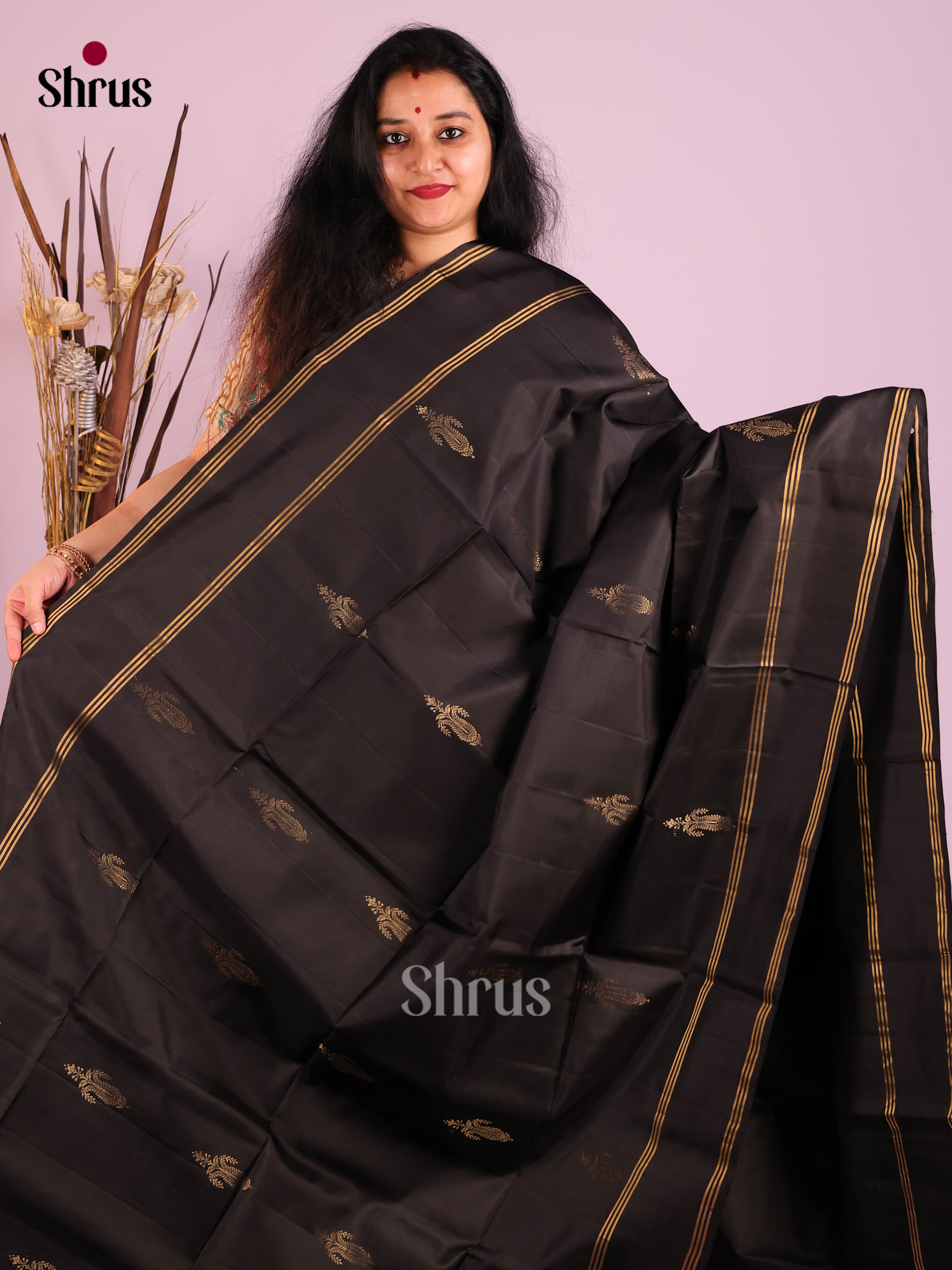 Mystique Black Soft Silk Saree with gold floral motifs & Rettaipet Zari Border 1