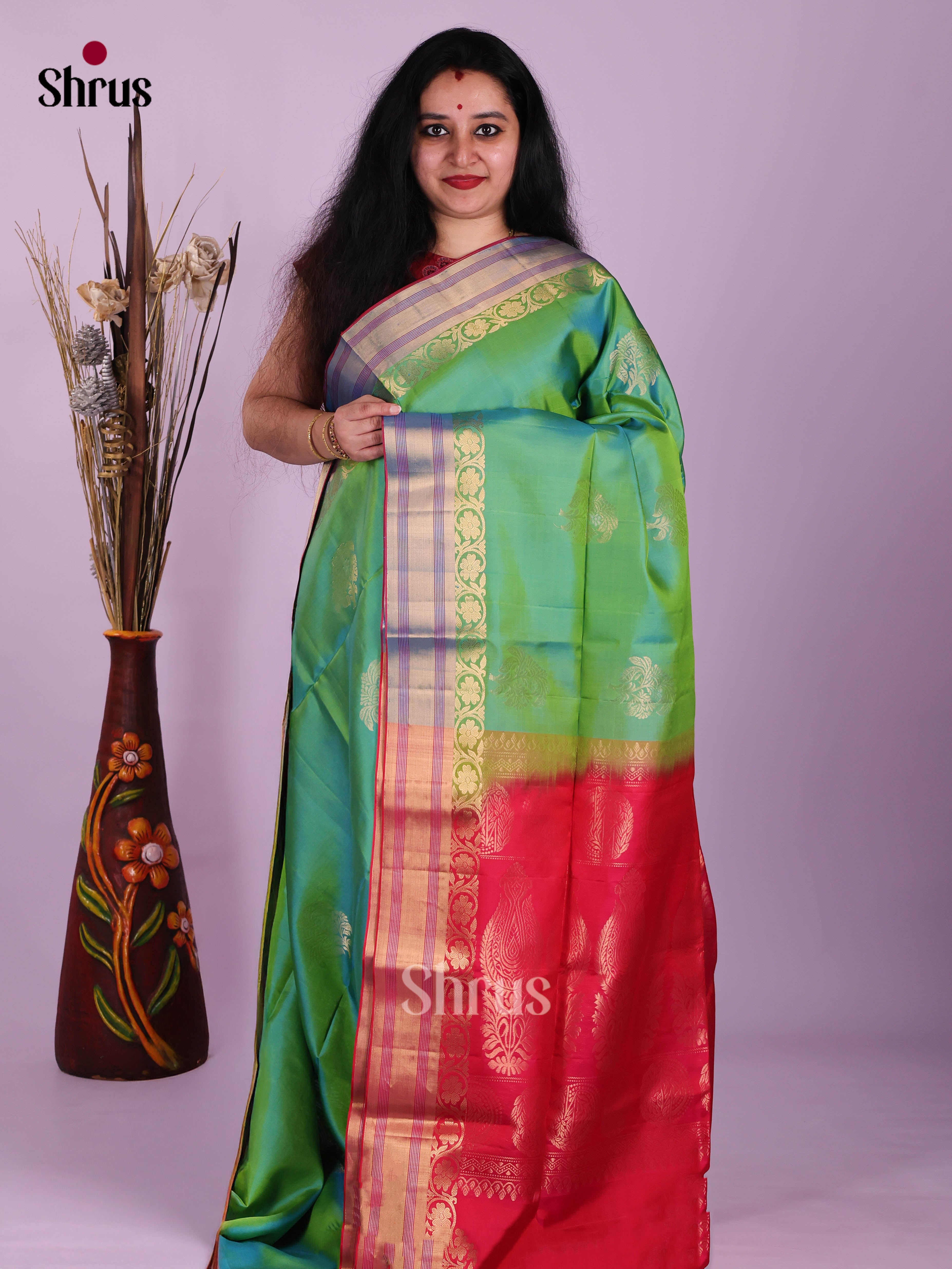 Vibrant Green Soft Silk Saree With Floral Motifs & Red Brocade Pallu