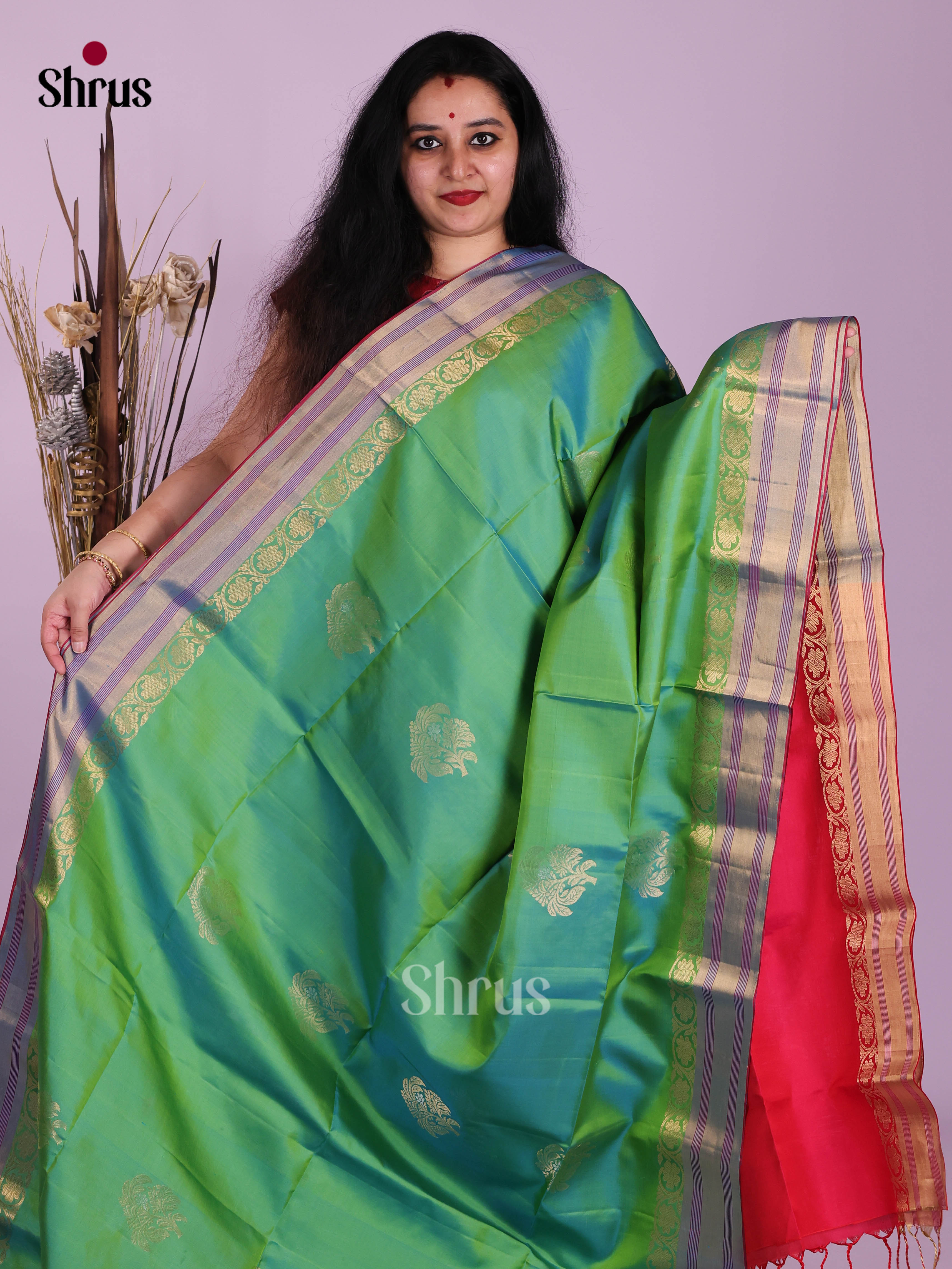 Vibrant Green Soft Silk Saree With Floral Motifs & Red Brocade Pallu