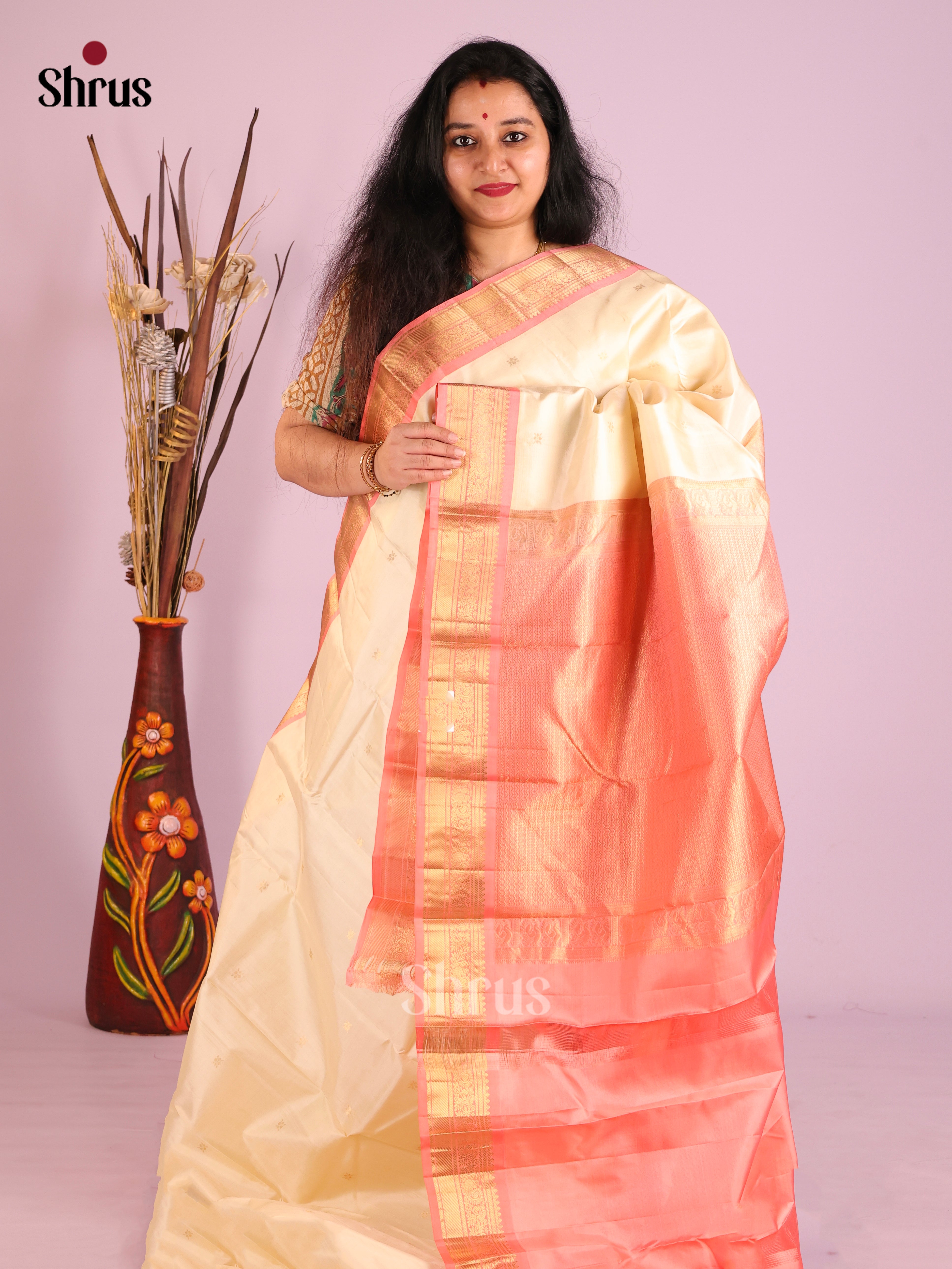 Shimmery Cream Kanjivaram Saree with zari buttas & Peachish Pink Brocade Pallu