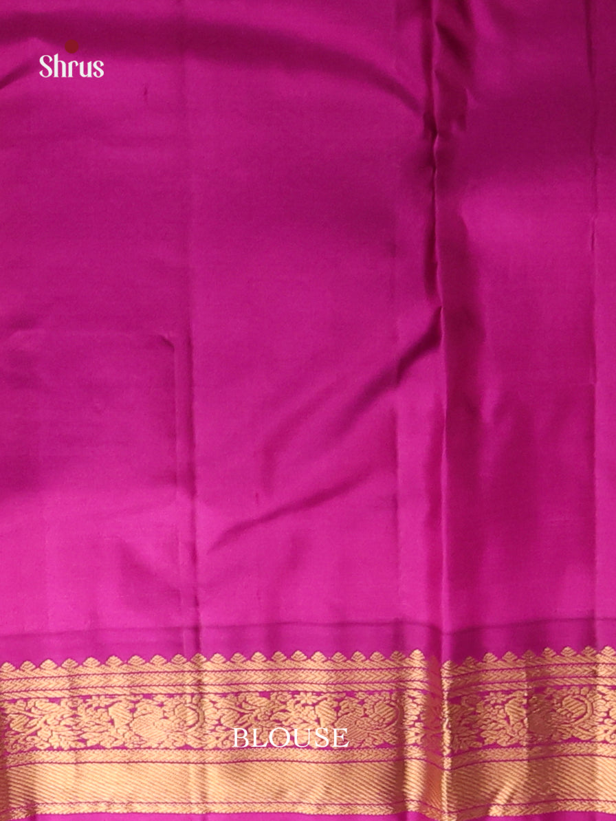 Gorgeous Baby Pink Kanjivaram Saree with Golden buttas & Purple zari border