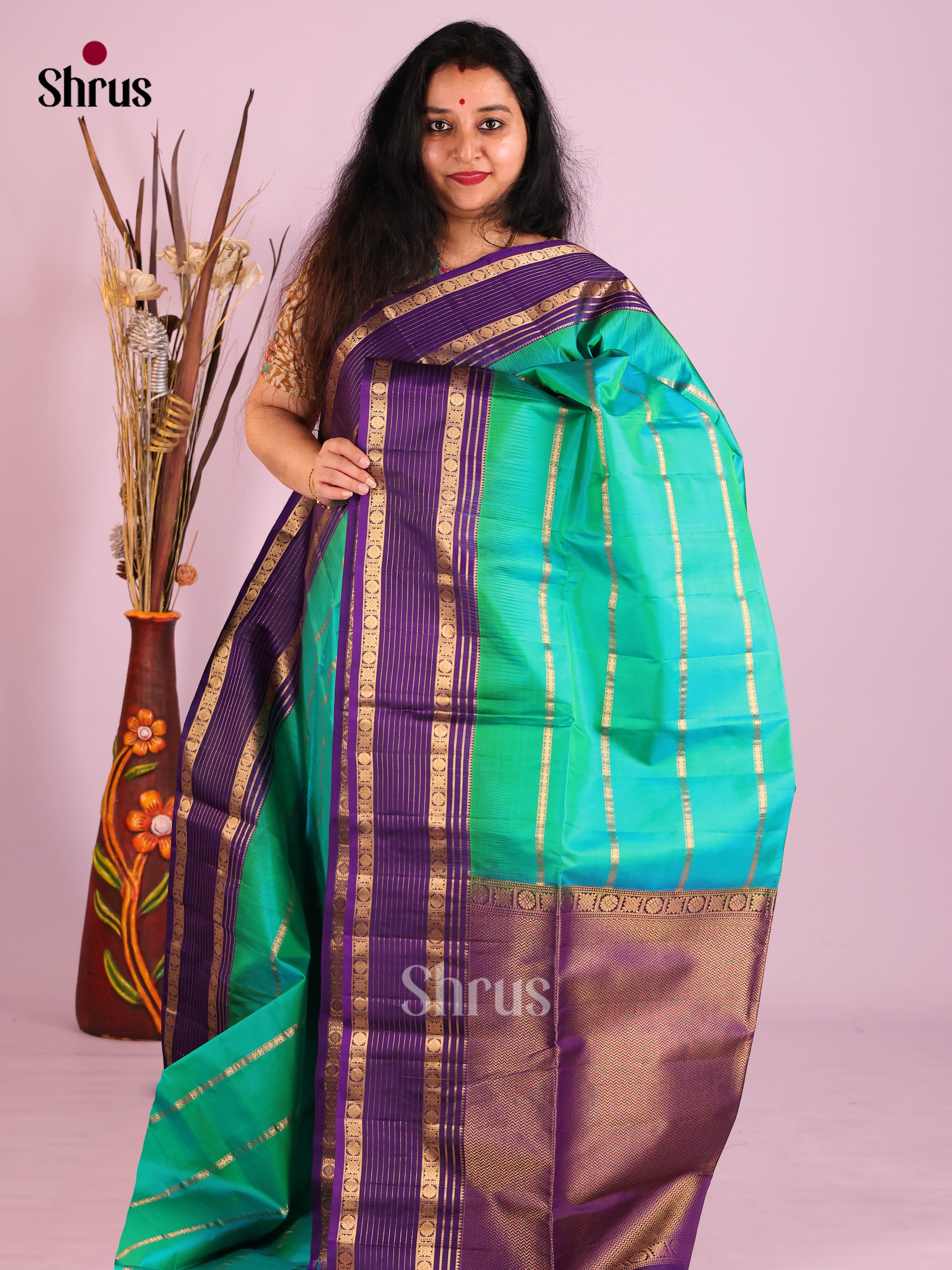 Classic Green & violet Soft Silk Saree with zari stripes, rettaipet border