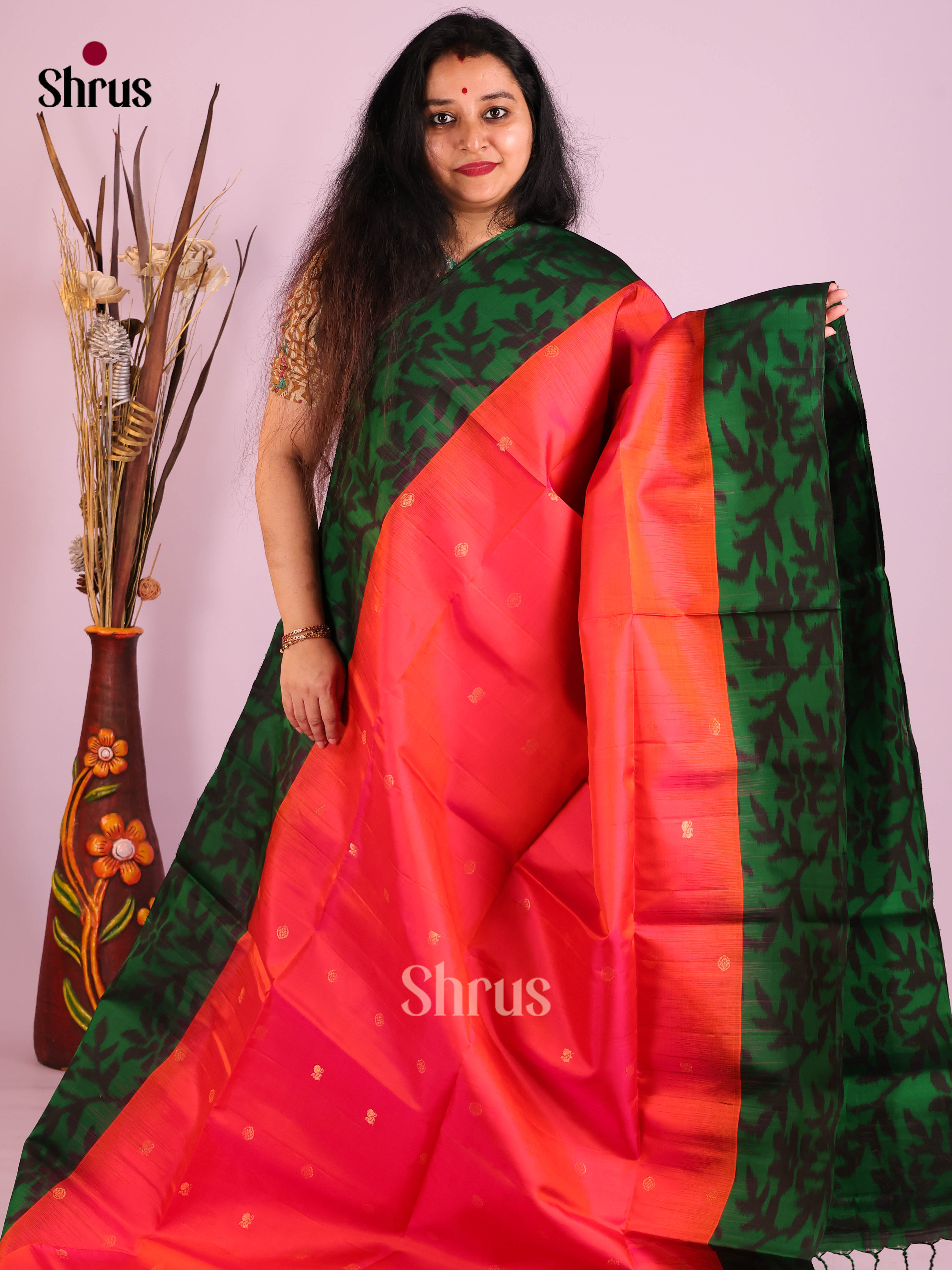Dazzling Orangish Pink Soft Silk Saree with Buttas & Green ikkat pochampally floral border 1
