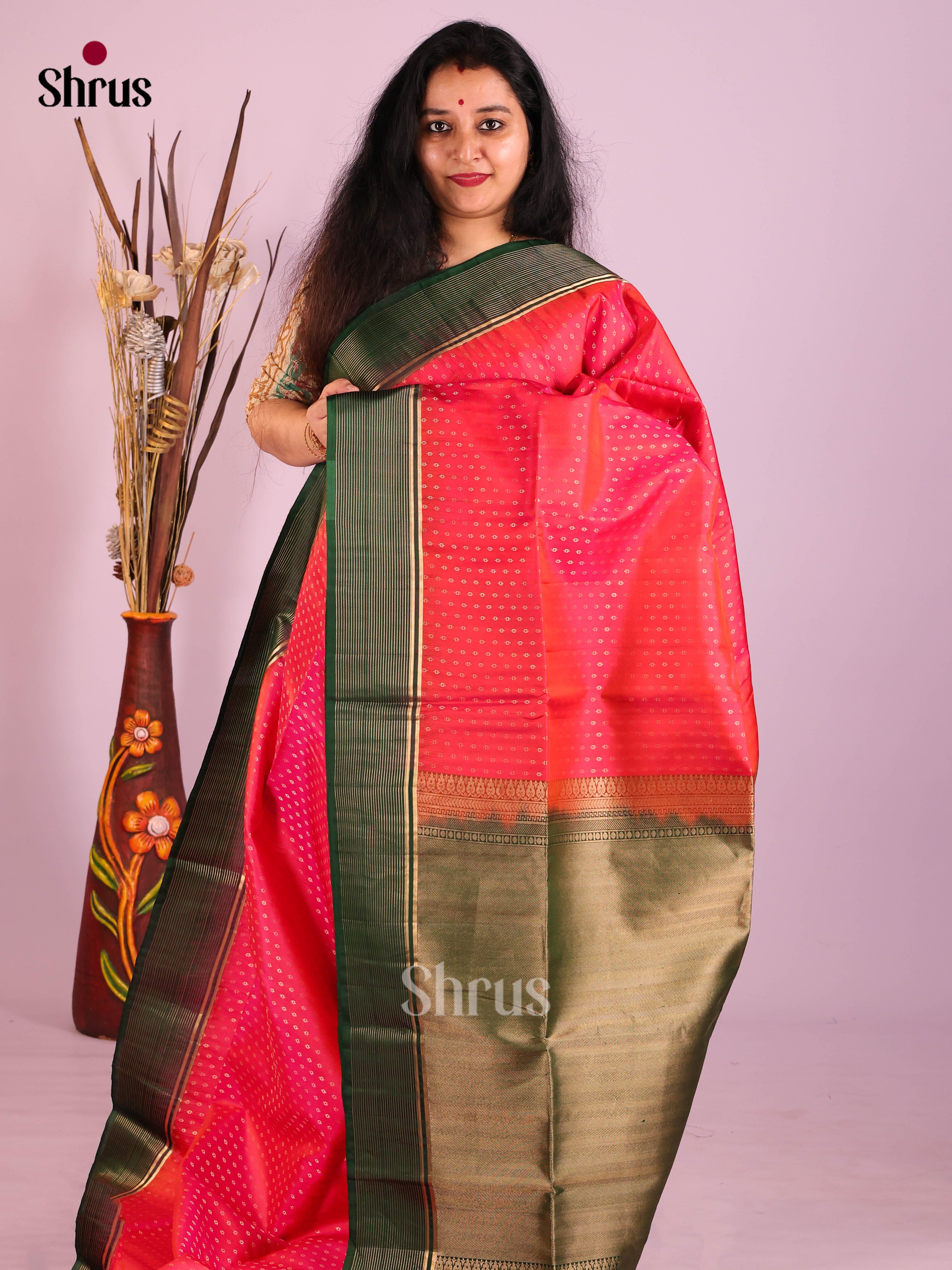 Beautiful Orangish Pink Soft Silk Saree with Intricate gold buttas & Green Brocade Border