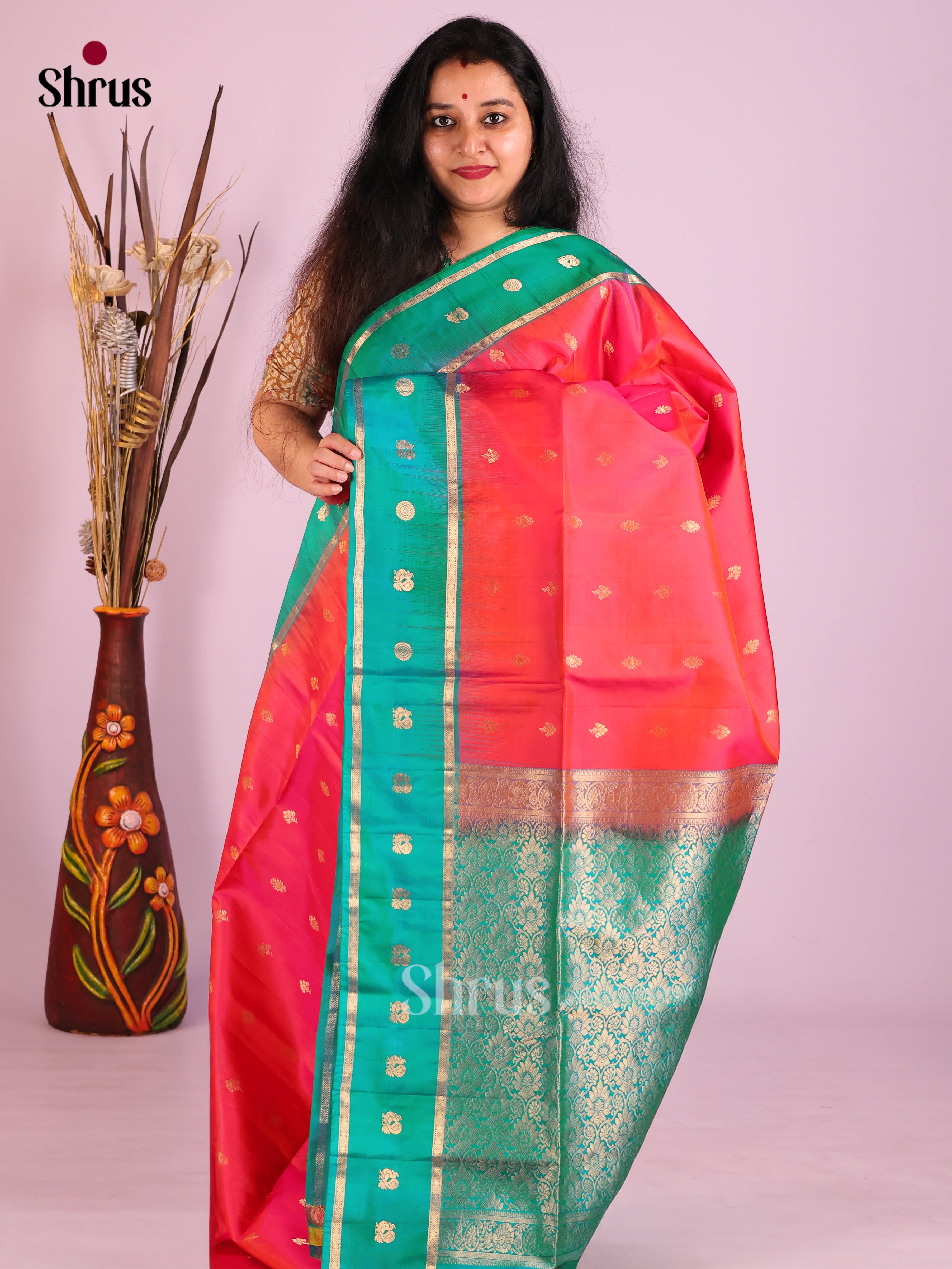 Radiant Orangish Pink Soft Silk Saree with gold floral buttas & Teal Rettaipet Zari Border