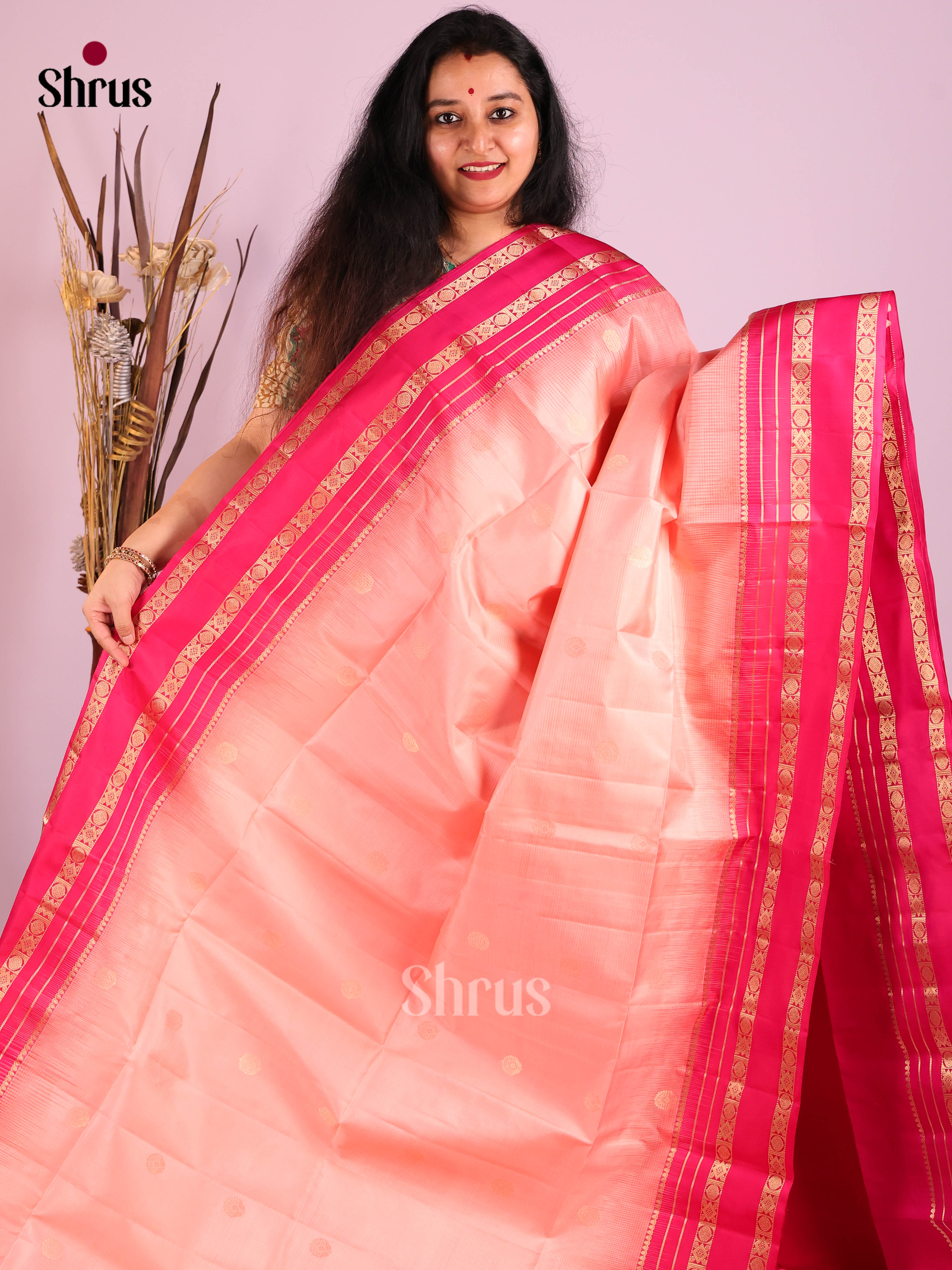 Charming Peach Soft Silk Saree with zari checks, floral buttas & Pink rettaipet border 1