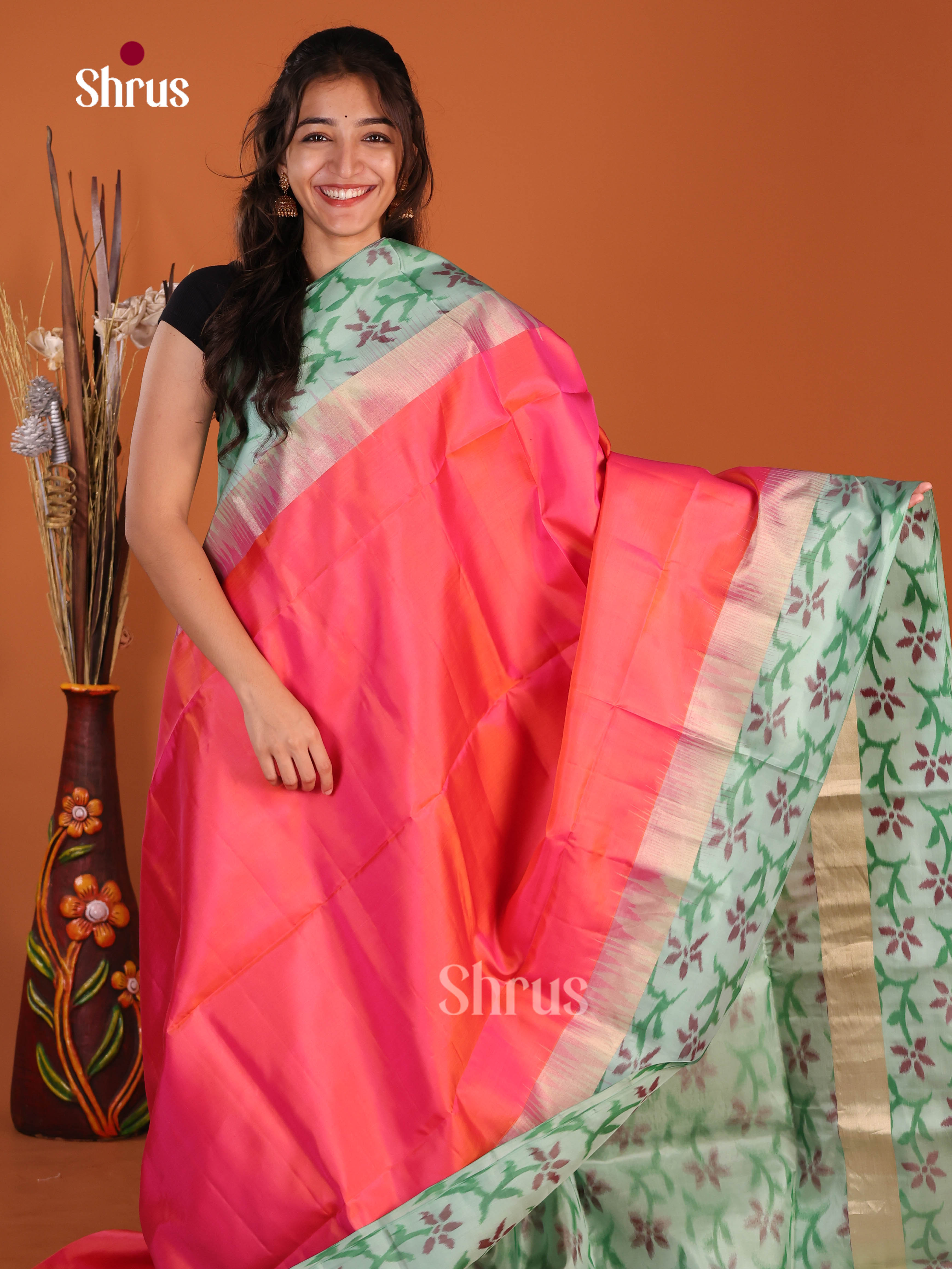 Stunning Orangish Pink Soft Silk Saree with mint green pochampally floral border