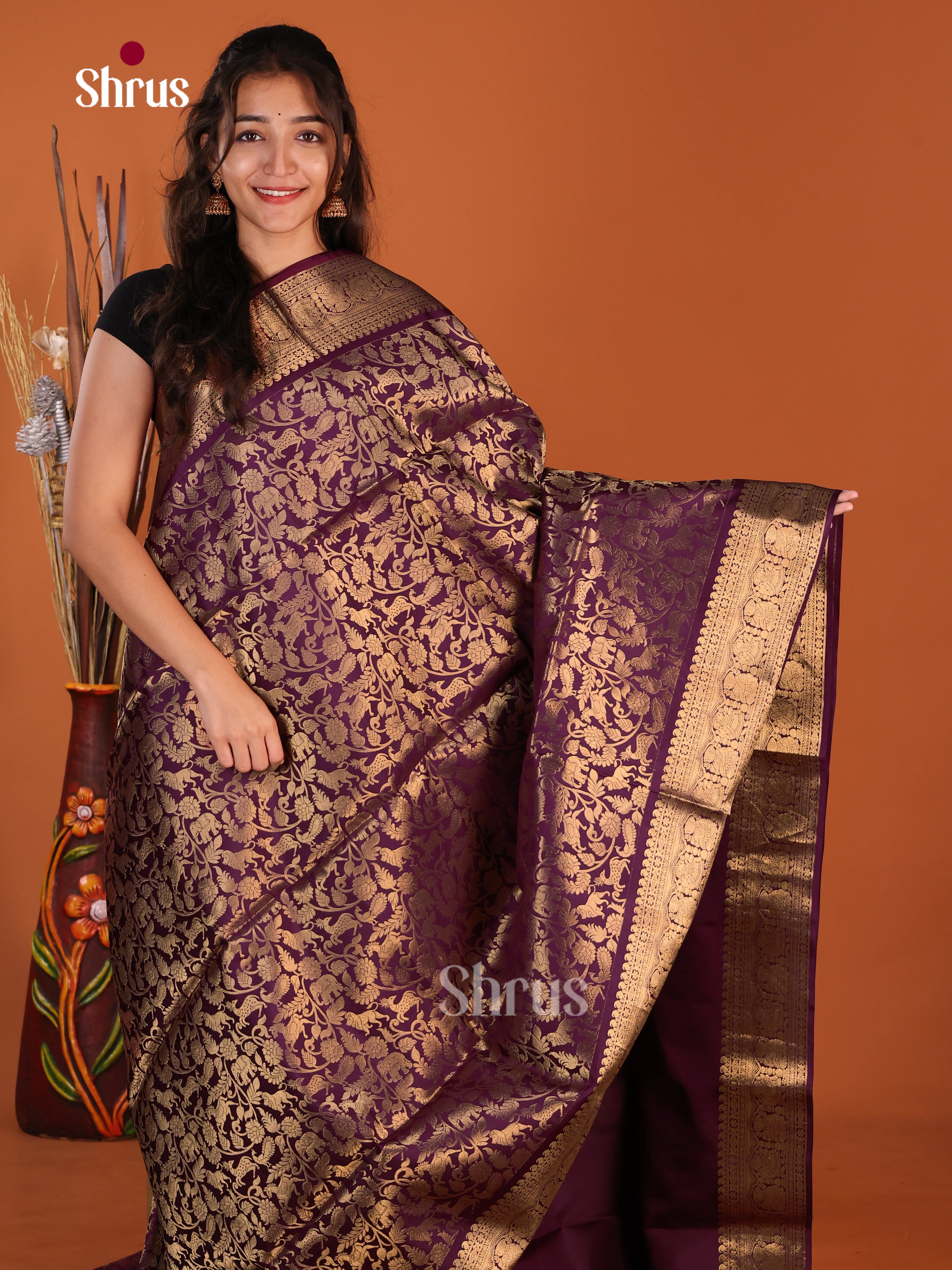 Dazzling Violet Single Tone Soft Silk Saree with vanasingaram zari floral nestling brocade
