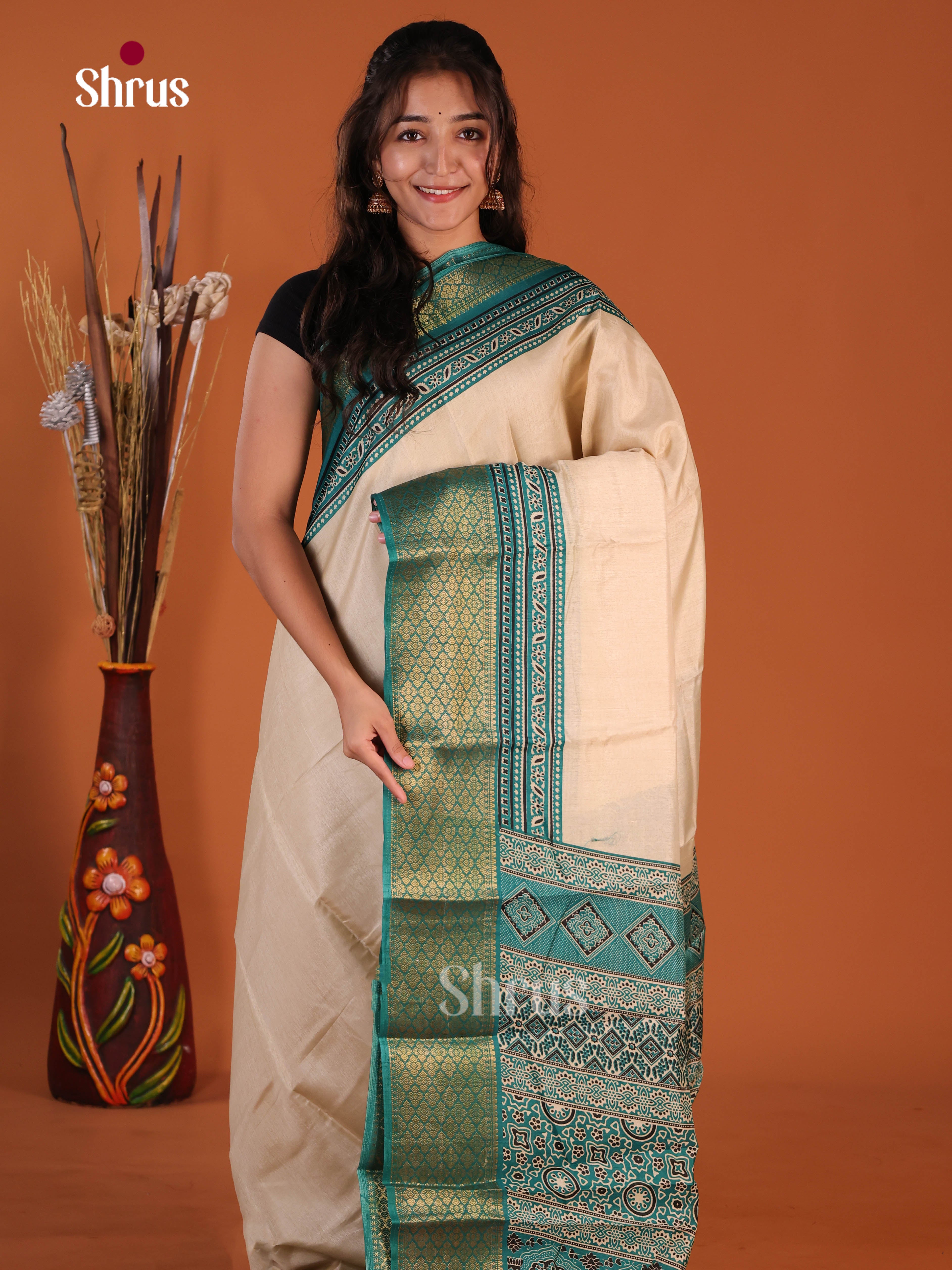 Cream & Green- Semi Crepe Saree