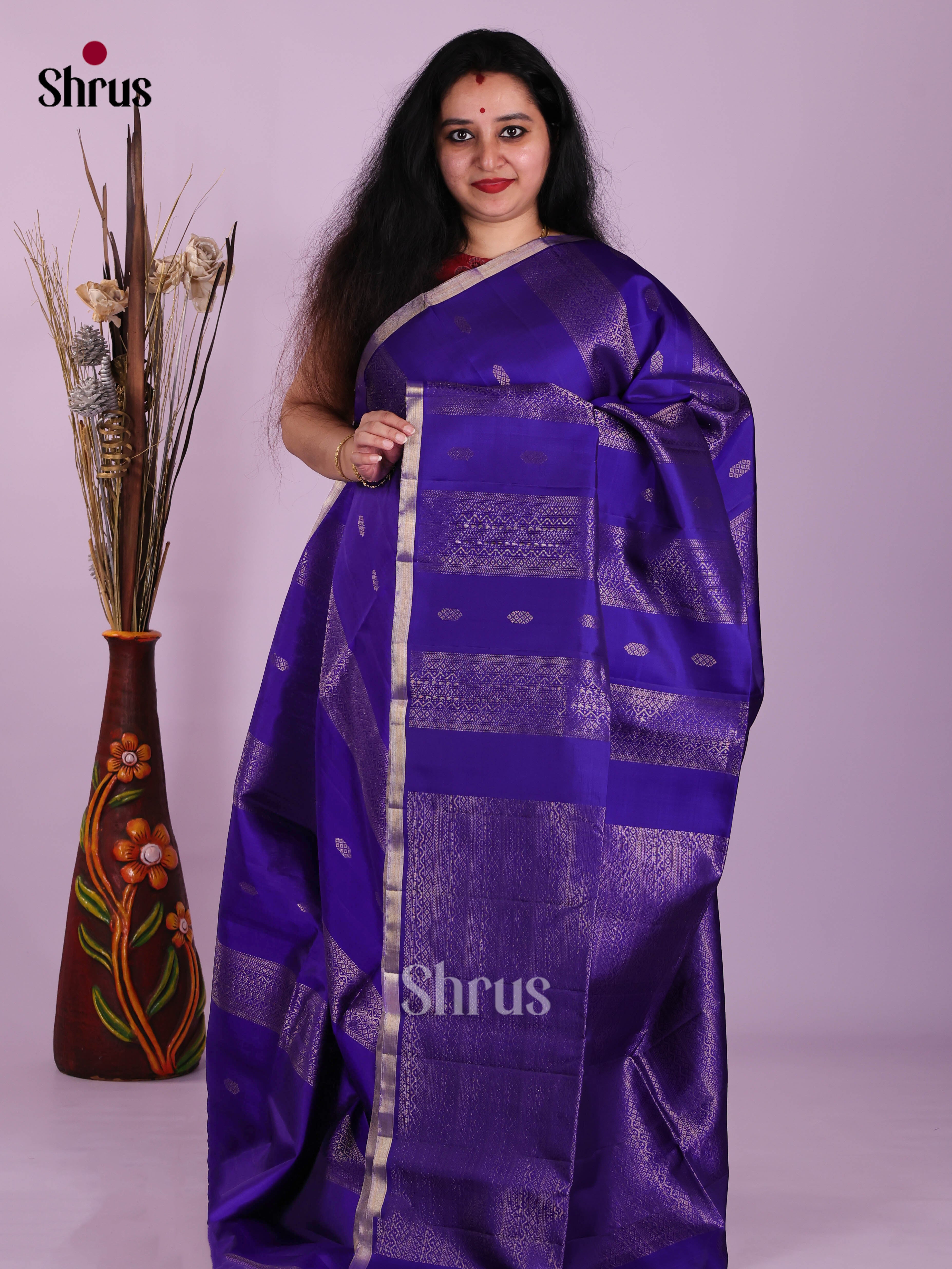 Majestic Blue single Tone Soft Silk Saree gleams with zari buttas , zari strapes