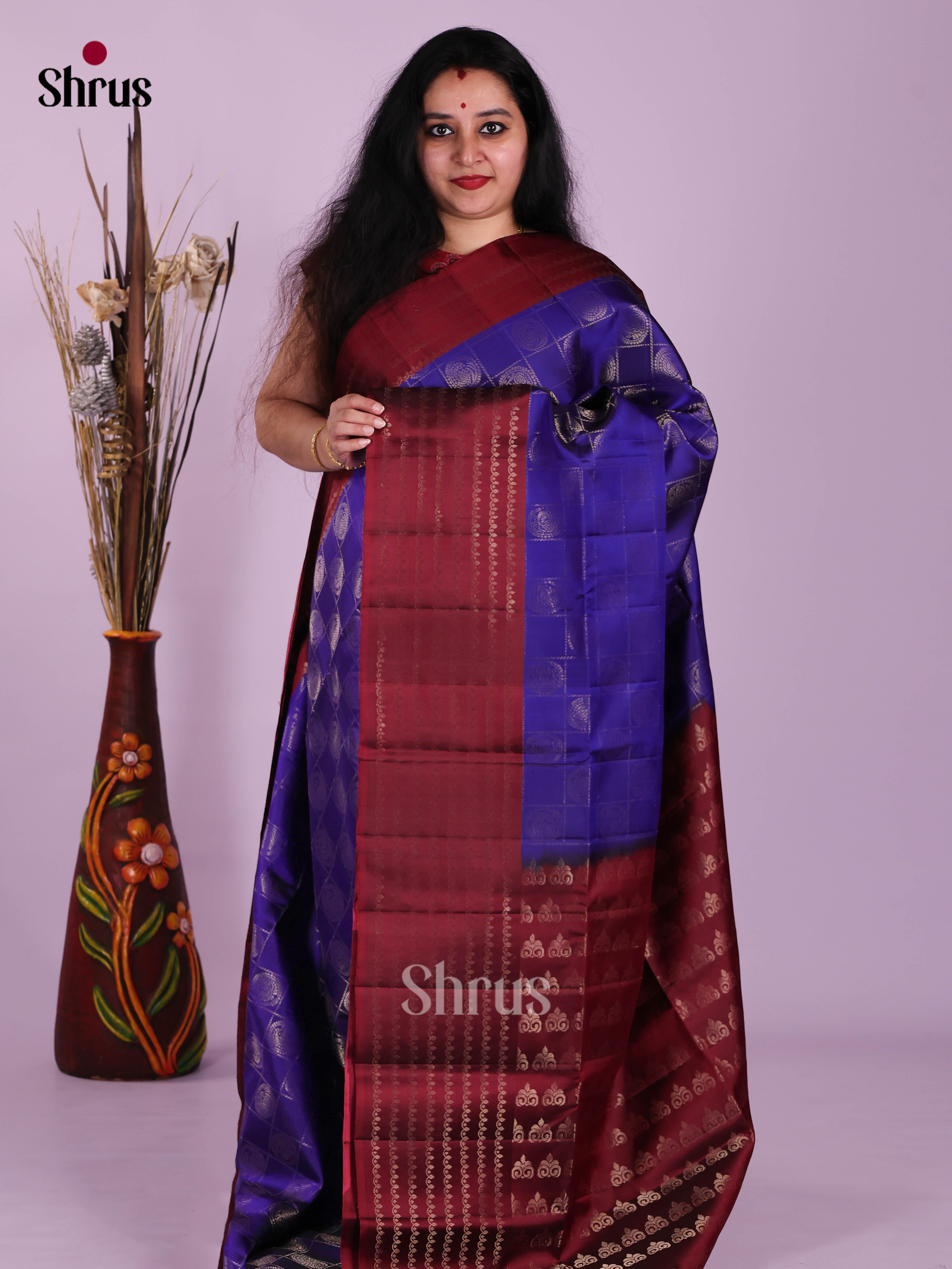 Exquisite Blue & Maroon Soft Silk Saree with gold zari checks & peacock motifs