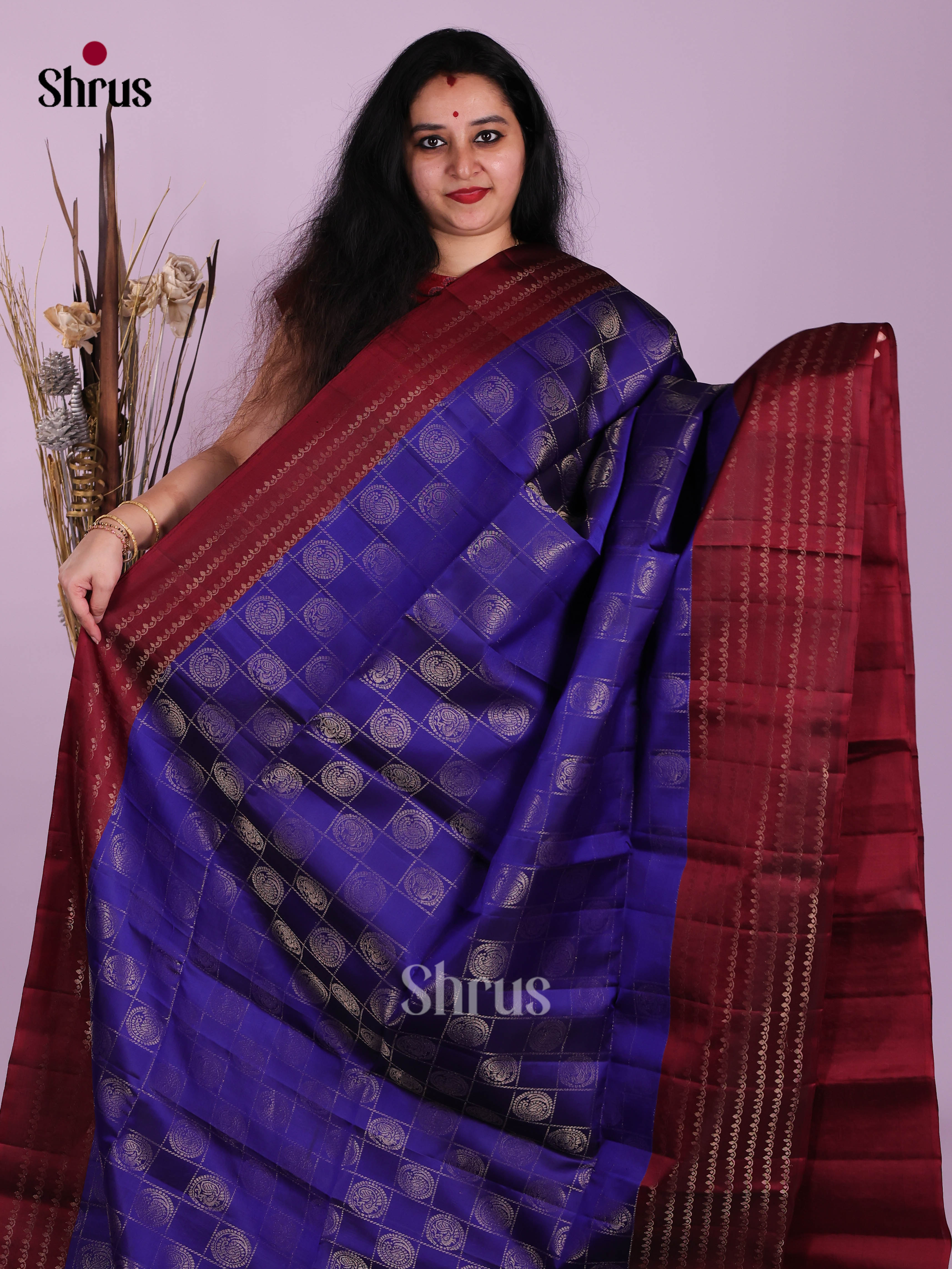 Exquisite Blue & Maroon Soft Silk Saree with gold zari checks & peacock motifs