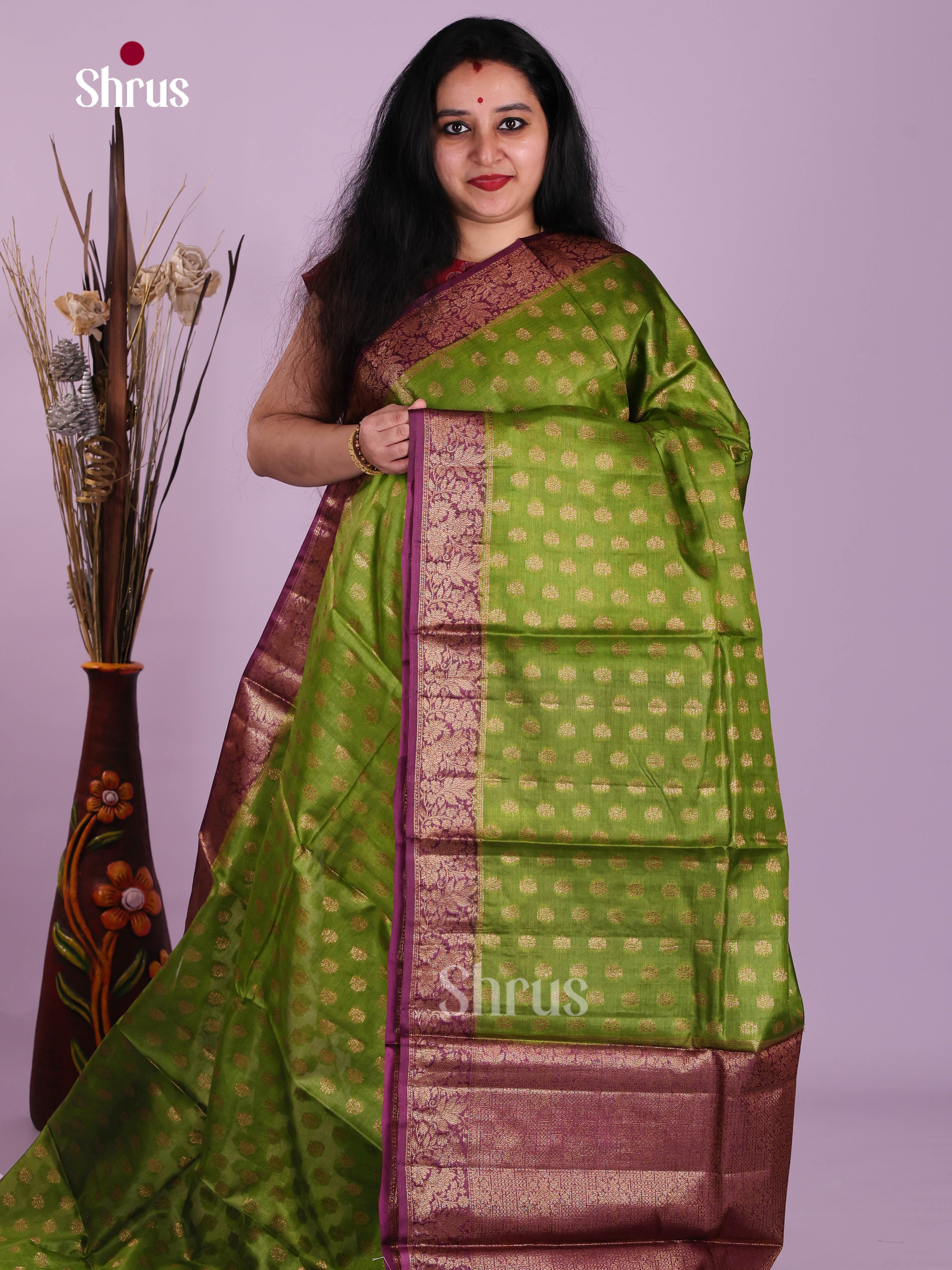 Beautiful Green Handloom Tussar Silk Saree With Zari Buttis & Purple Pallu