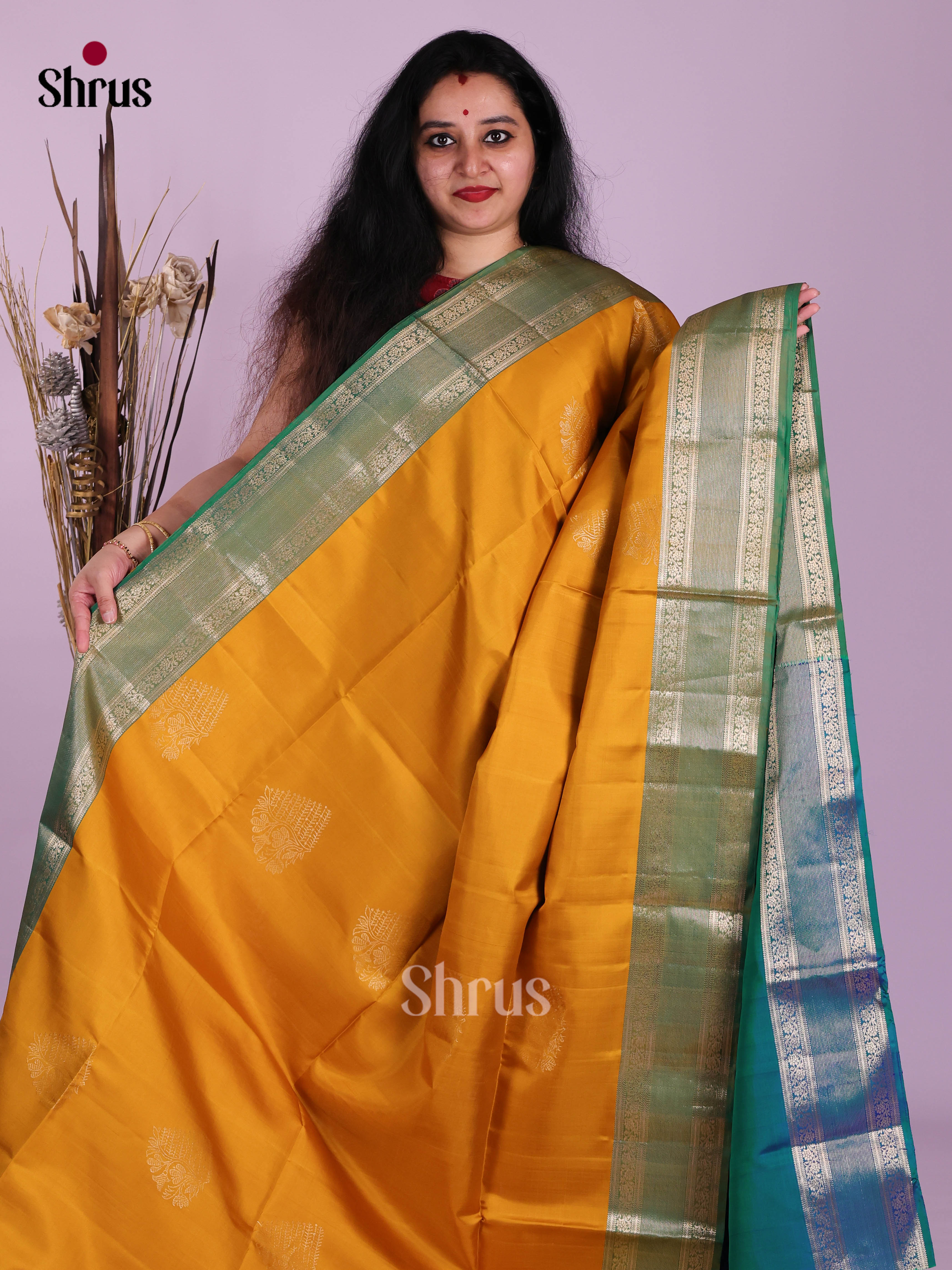 Glorious Mambazha Yellow & Blue Soft Silk Saree gleams with zari floral motifs - Shop on Shrus.com