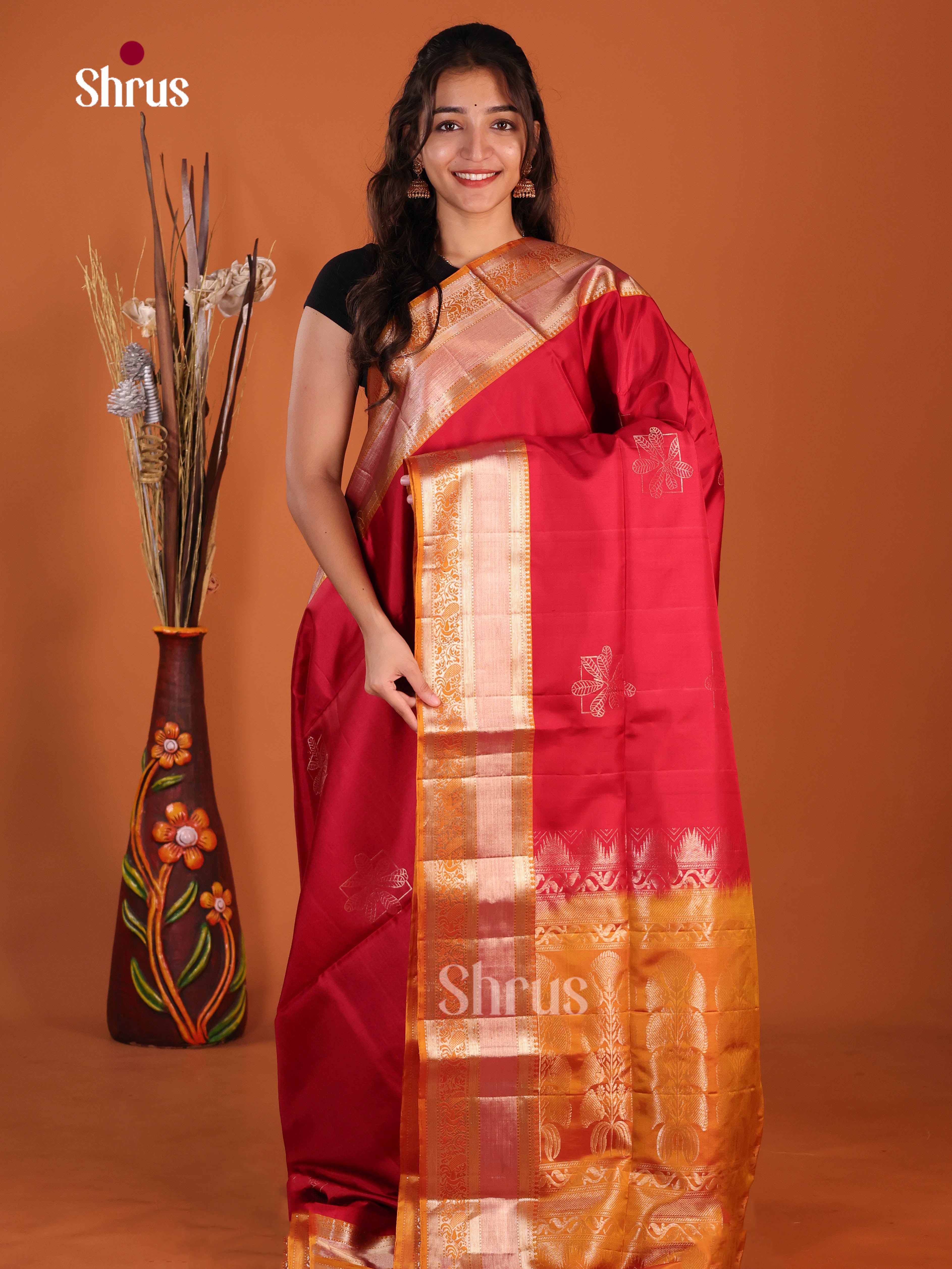 Classic Red & Mustard Soft Silk Saree gleams with zari floral motifs , rich zari border