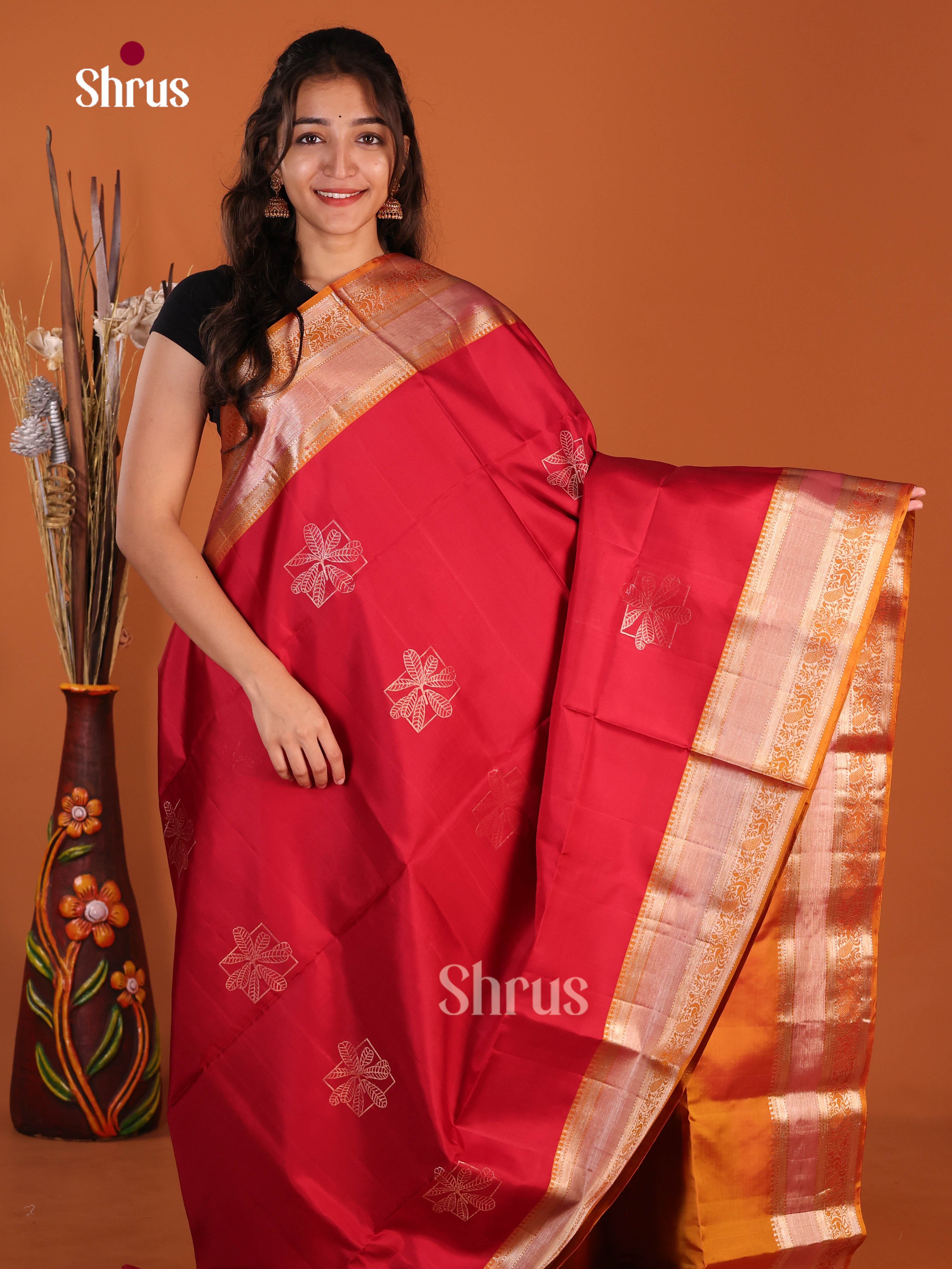 Classic Red & Mustard Soft Silk Saree gleams with zari floral motifs , rich zari border