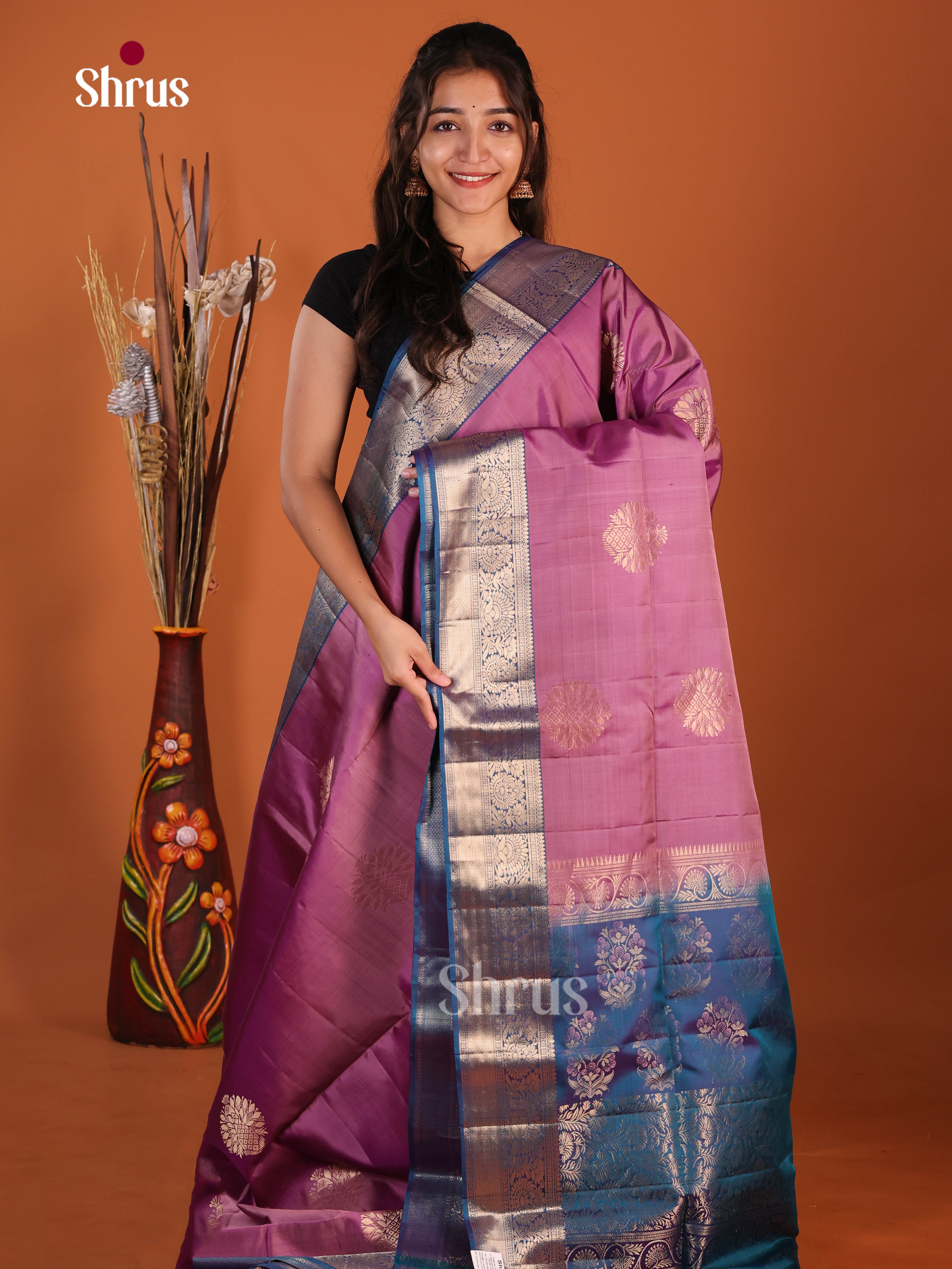Subtle Onion Pink & Blue Soft Silk Saree gleams with zari floral motifs - Shop on Shrus.com