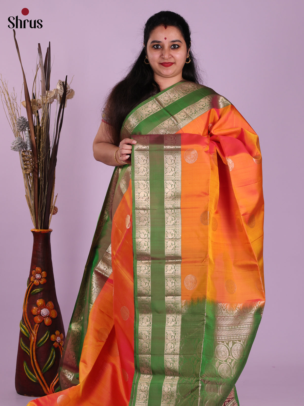 Stunning Mambhazha Yellow Soft Silk Saree With Circular Motifs & Green Pallu