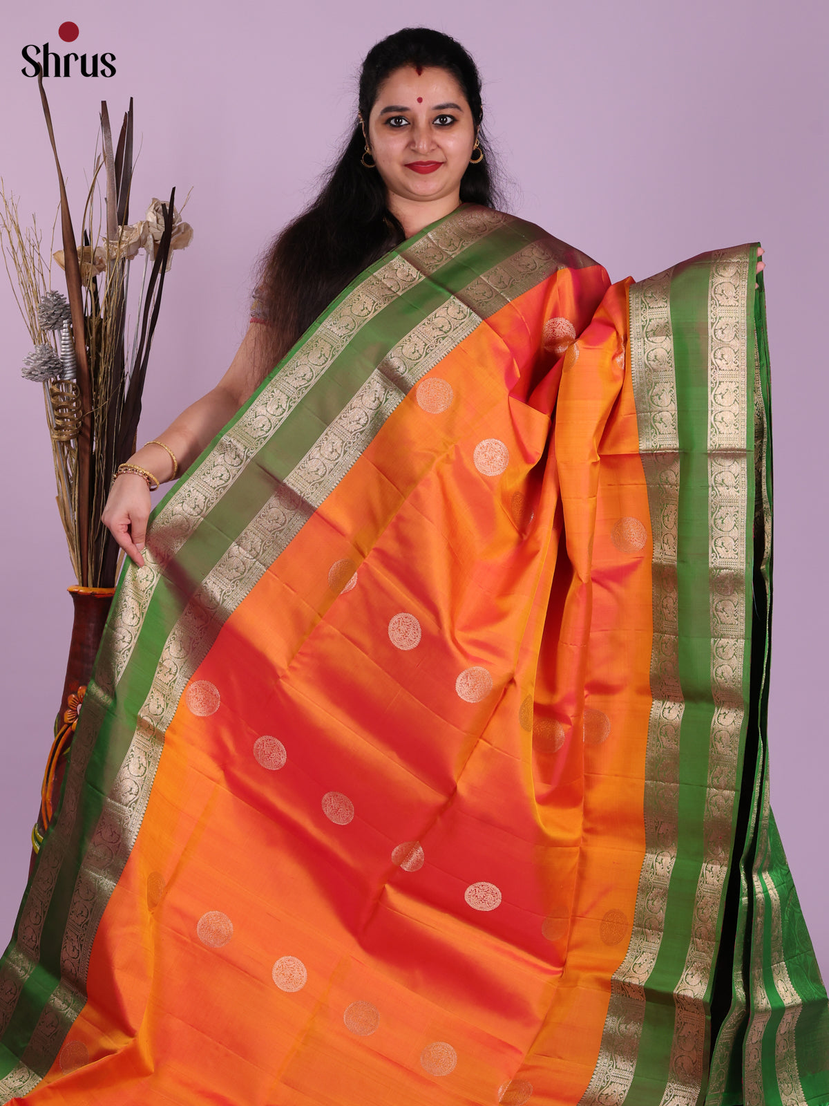 Stunning Mambhazha Yellow Soft Silk Saree With Circular Motifs & Green Pallu
