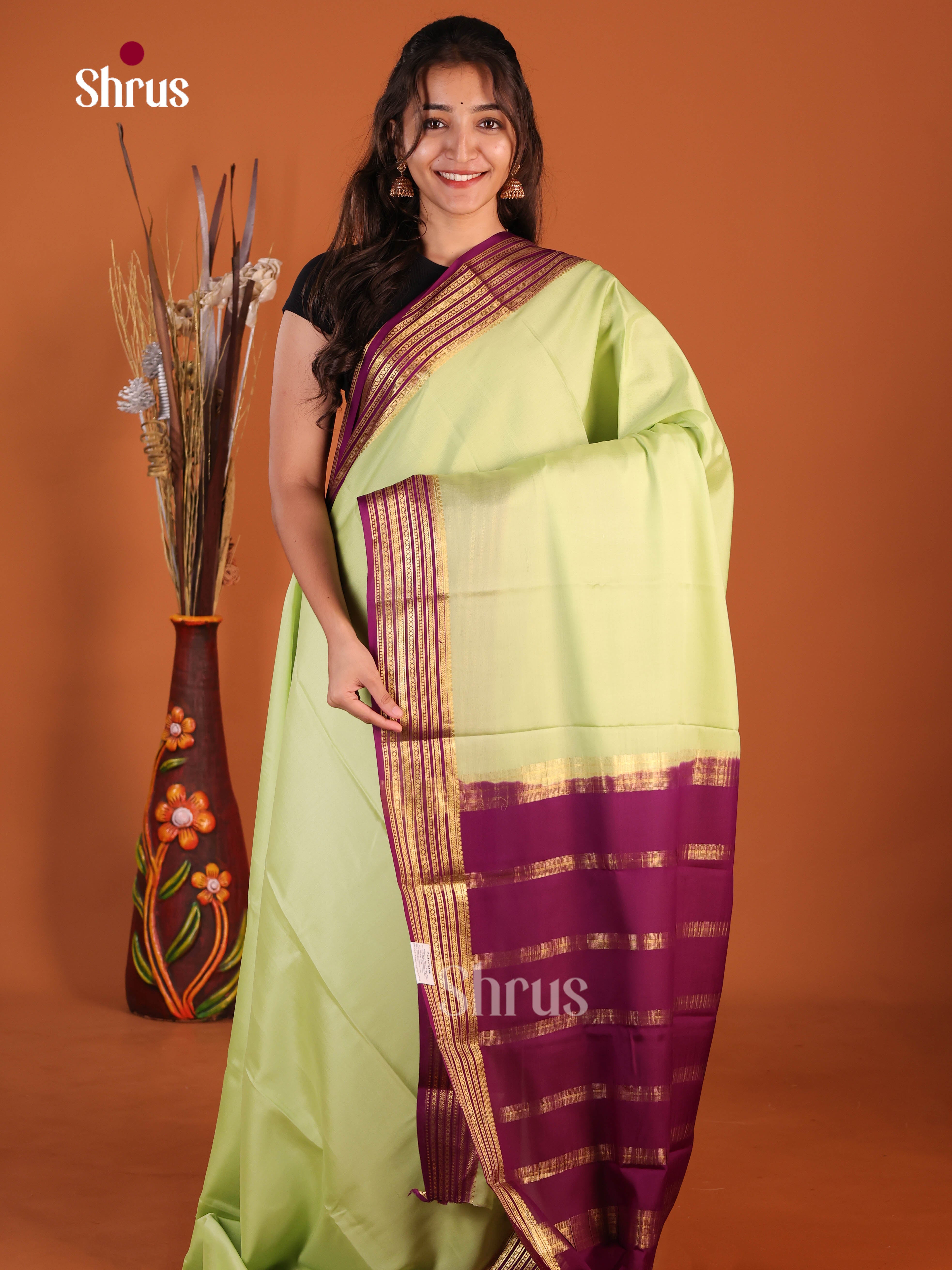 Graceful Pista Green & Purple Mysore Silk Saree with traditional zari border