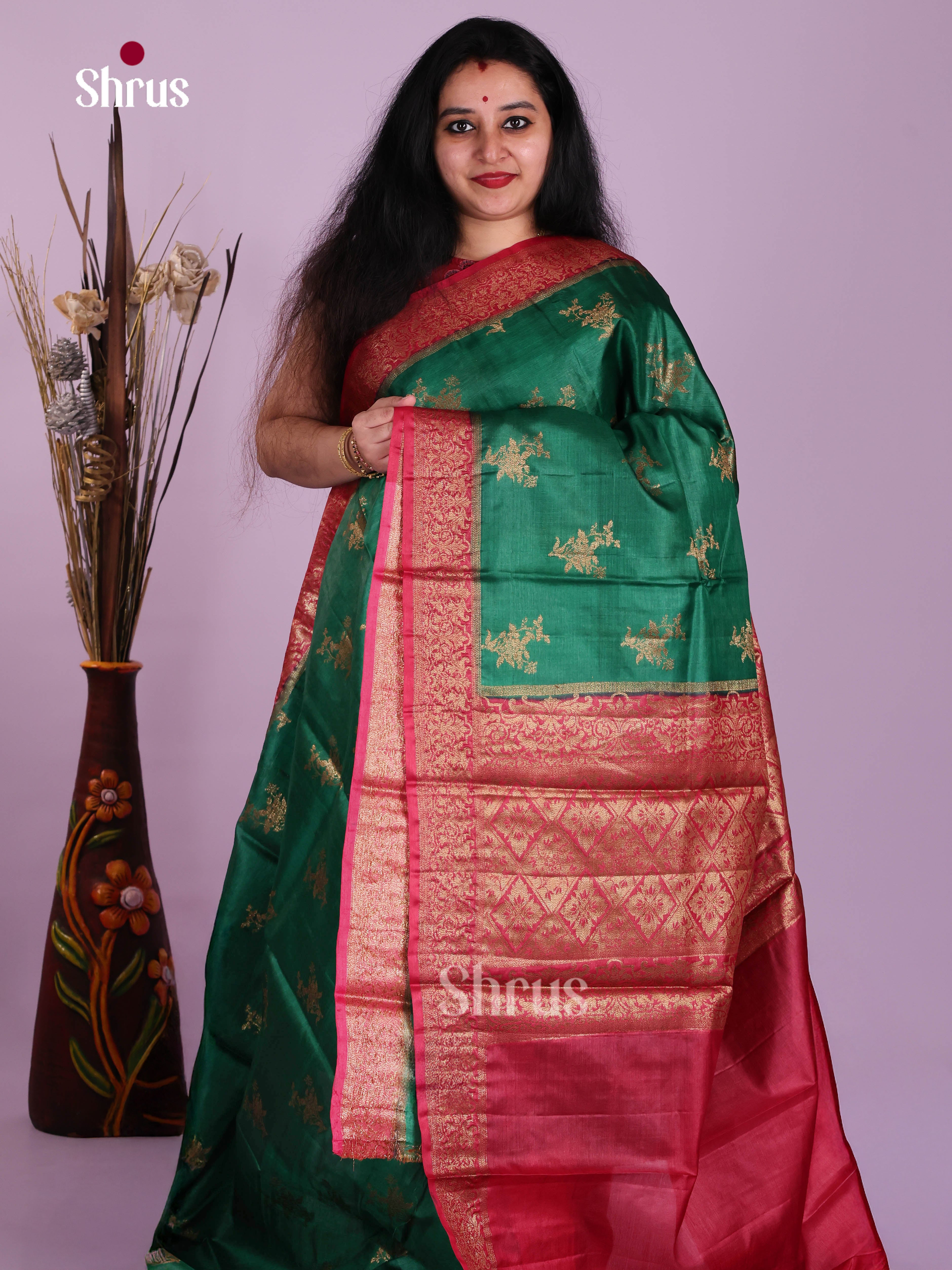 Opulent Green Handloom Tussar Saree With Floral Motifs & Red Zari Pallu