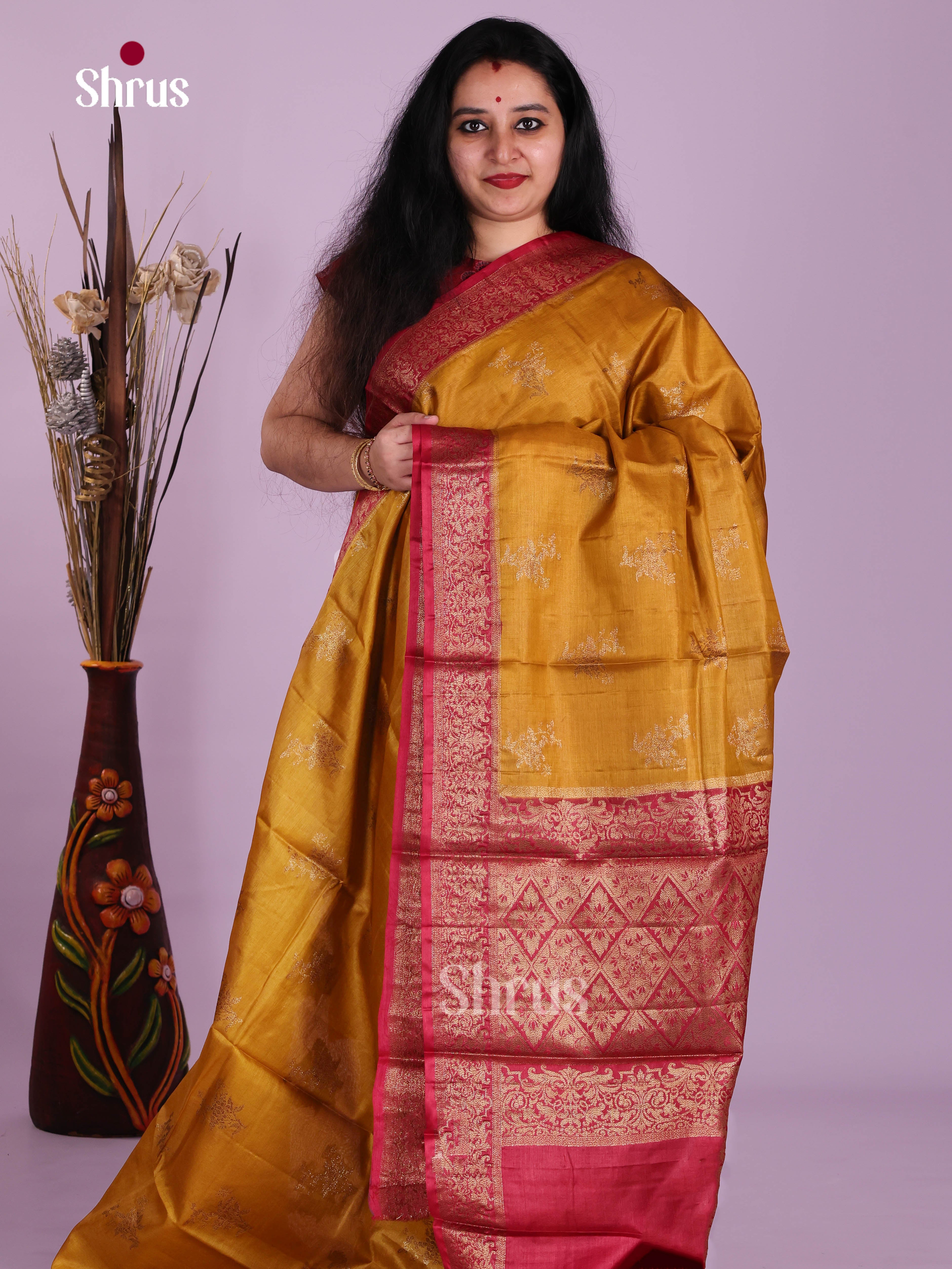 Pretty Mustard Handloom Tussar Saree With Floral Motifs & Deep Red Pallu