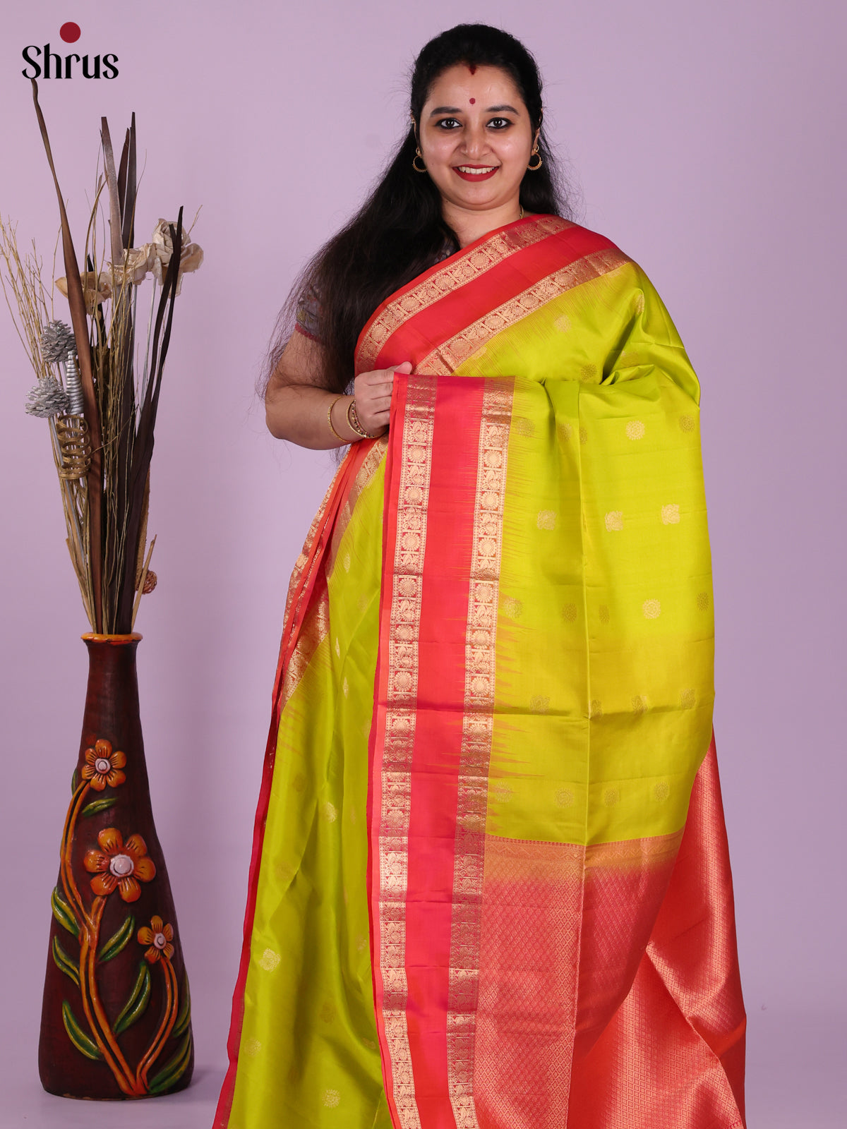 Ethereal Lime Green Soft Silk Saree with gold zari peacock buttas , rettaipet border