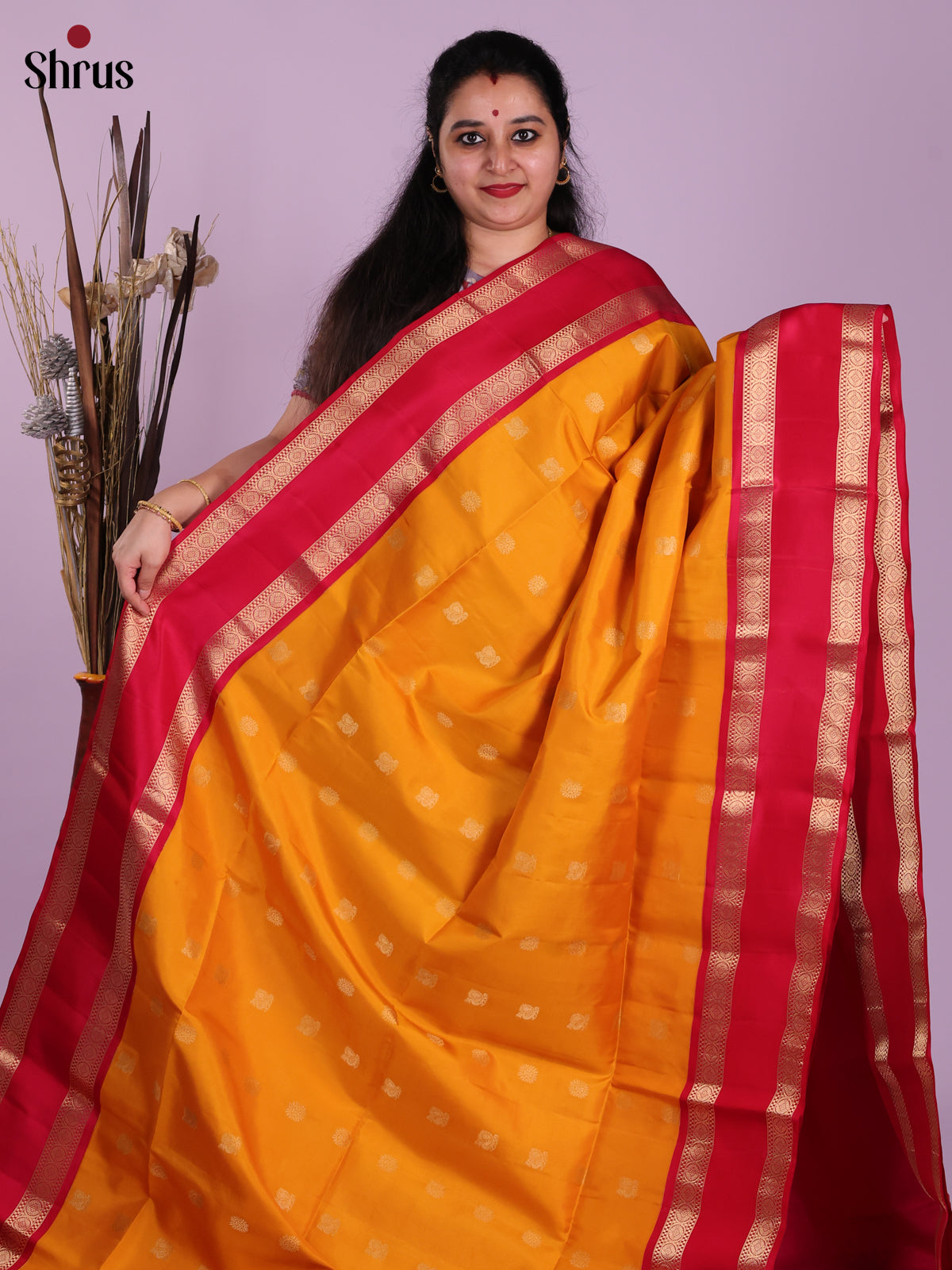 Luminous Yellow Soft Silk Saree With Golden Buttas & Red Rettaipet Zari Border