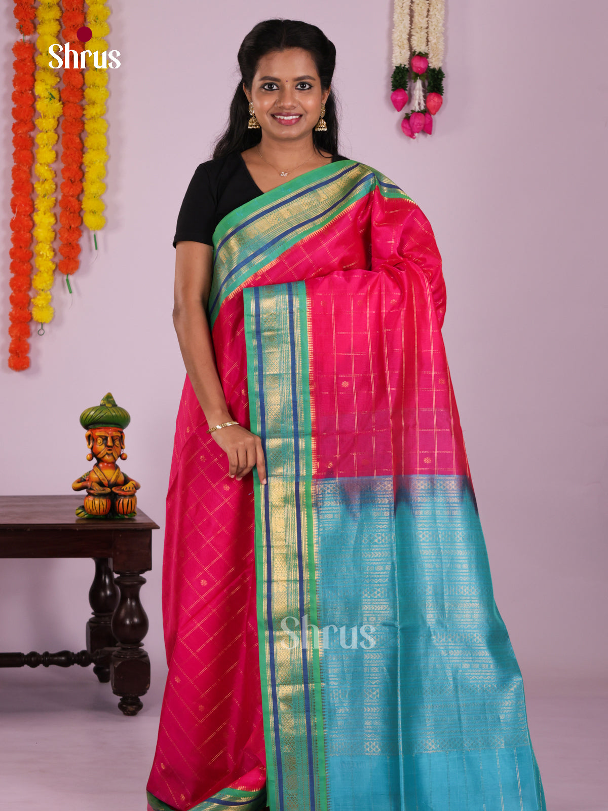 Charming Pink & teal Green Silk Cotton Saree with zari buttas