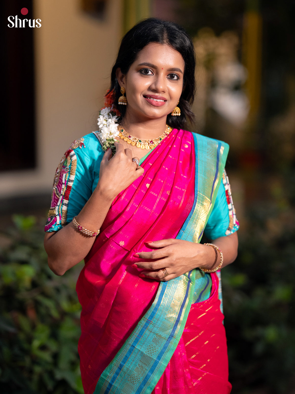 Charming Pink & teal Green Silk Cotton Saree with zari buttas