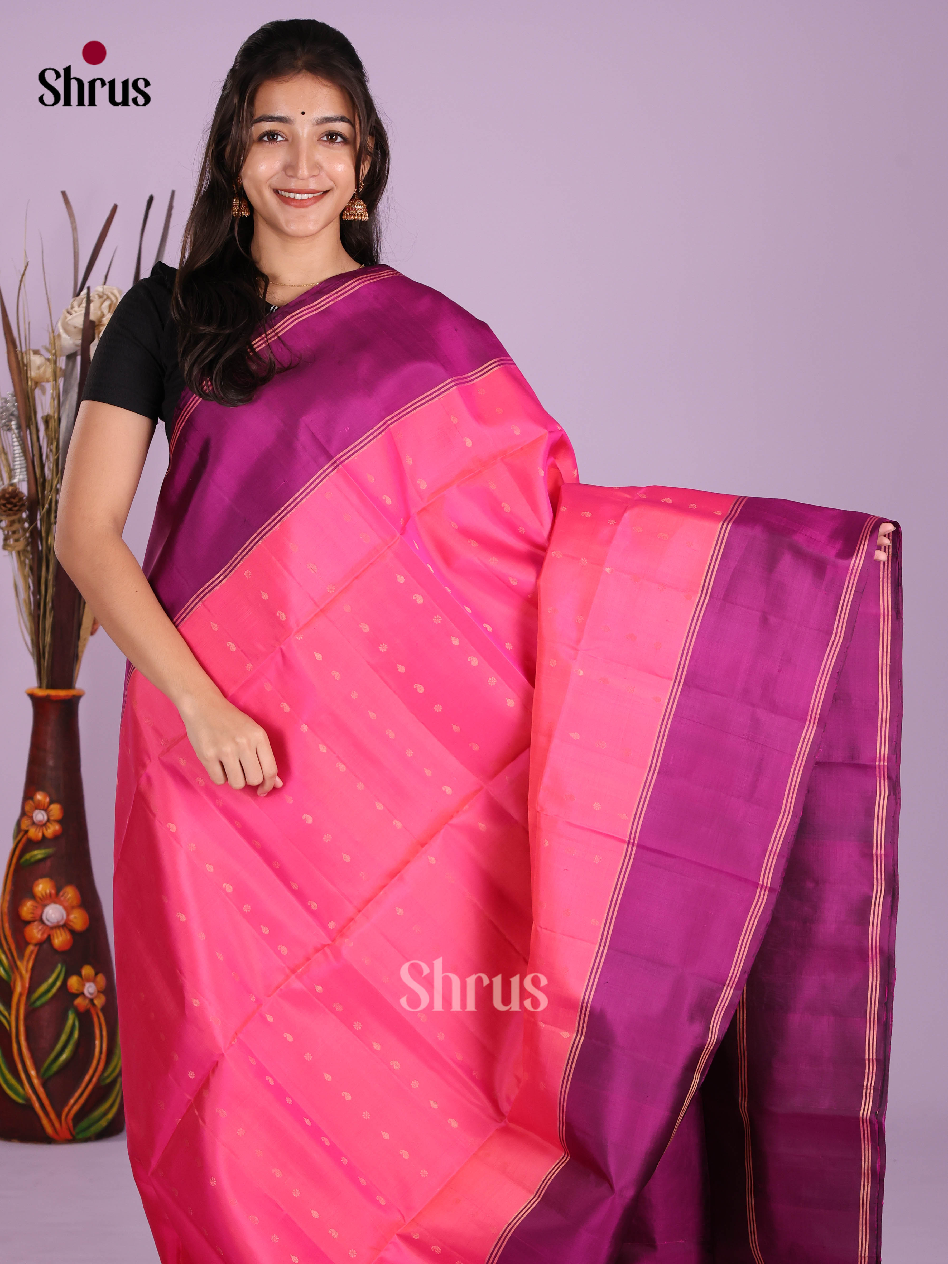 Charming Pink & Purple Soft Silk Saree gleams with zari buttas & brocade pallu