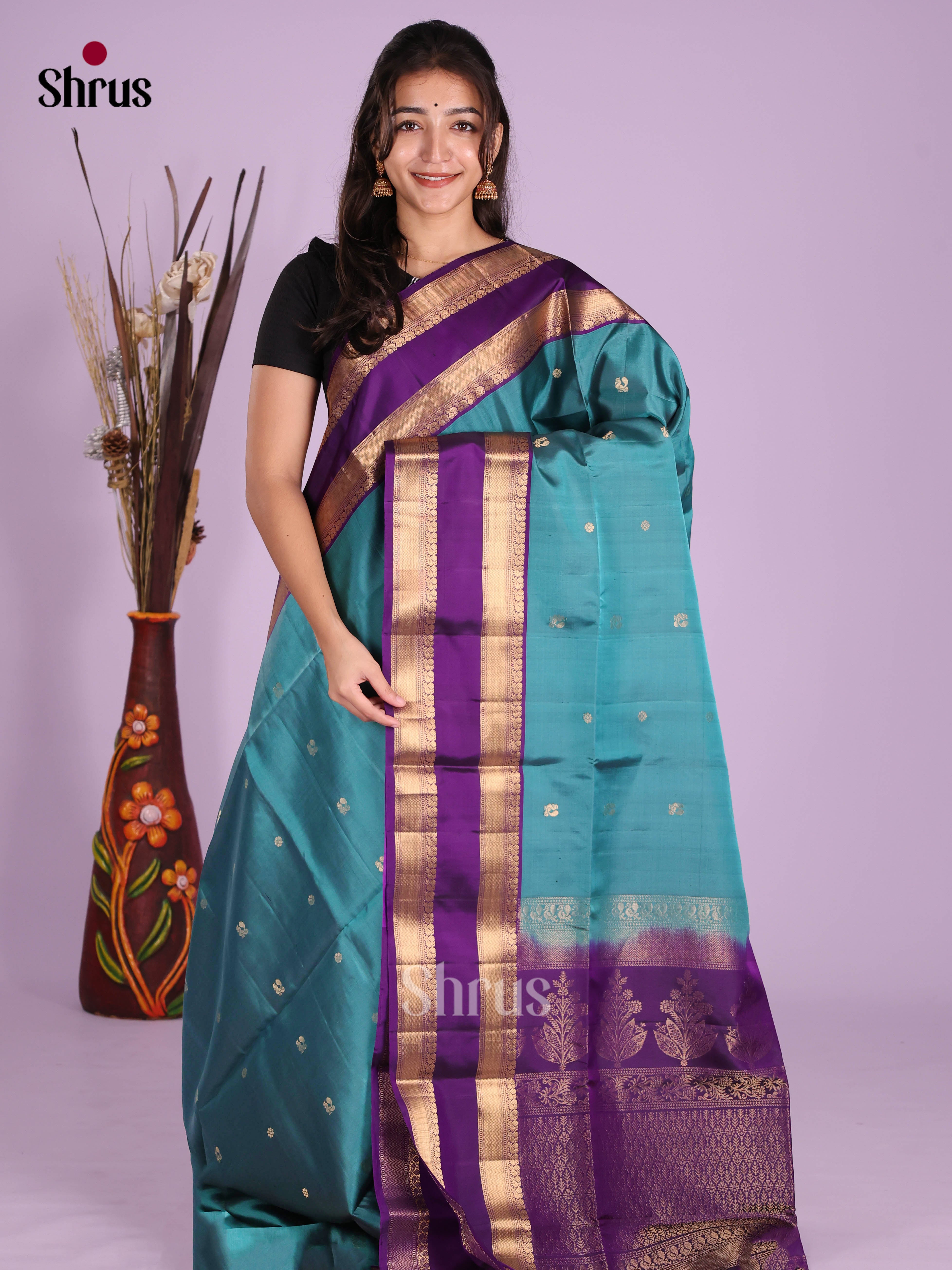 Blue & Violet Soft Silk Saree with peacock , floral buttas , rettaipet border